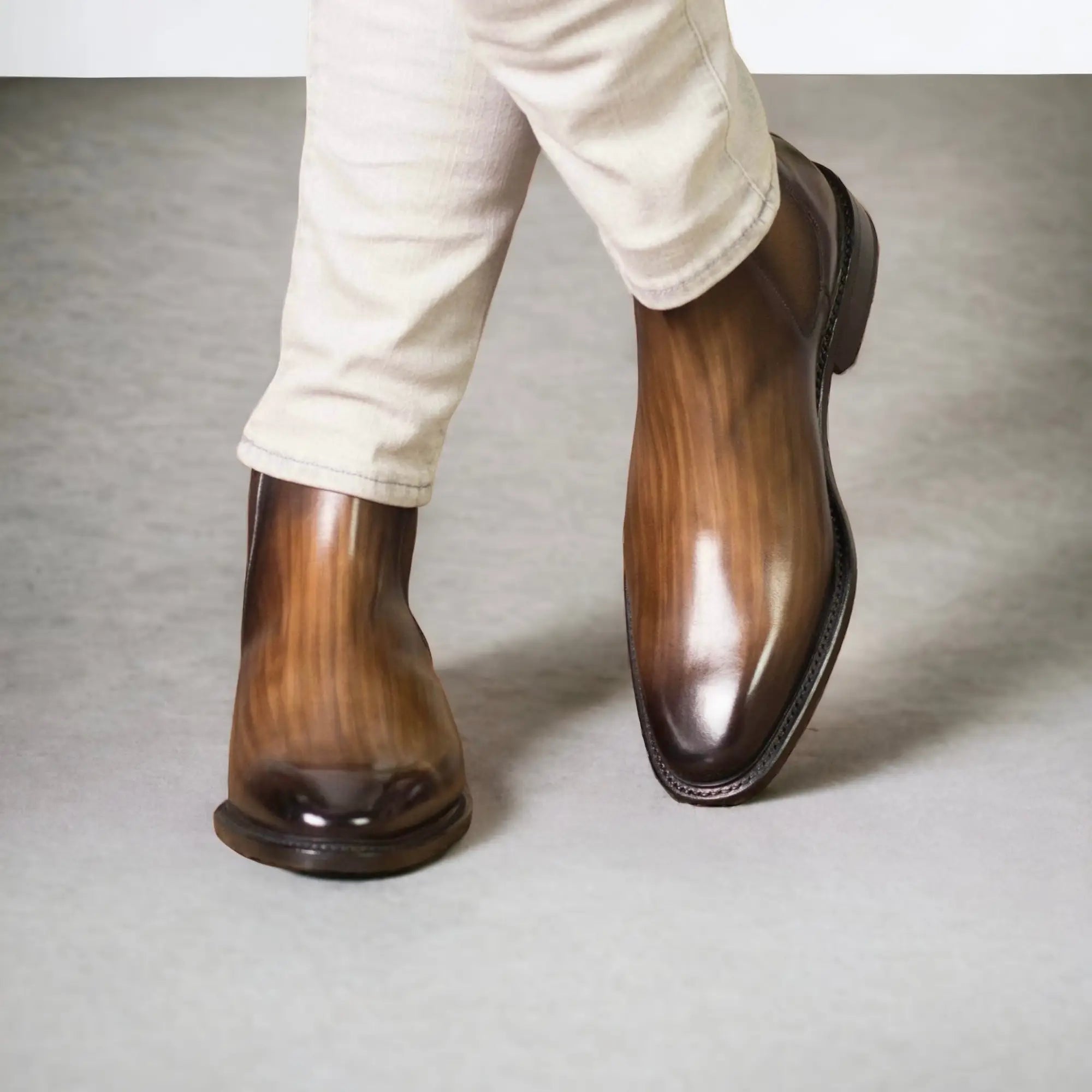 Brown leather Chelsea boots.