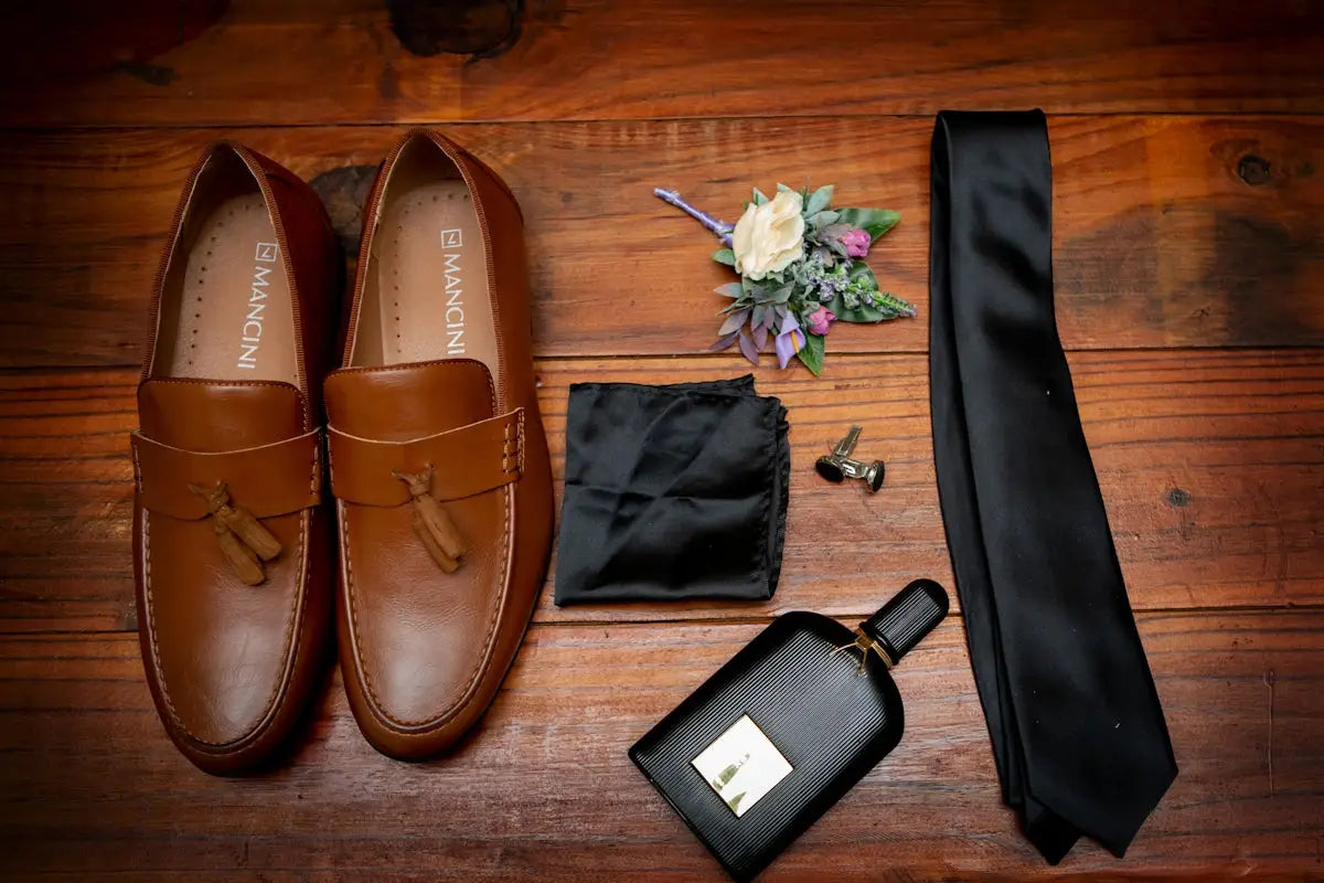 brown leather boat shoes beside black leather wallet