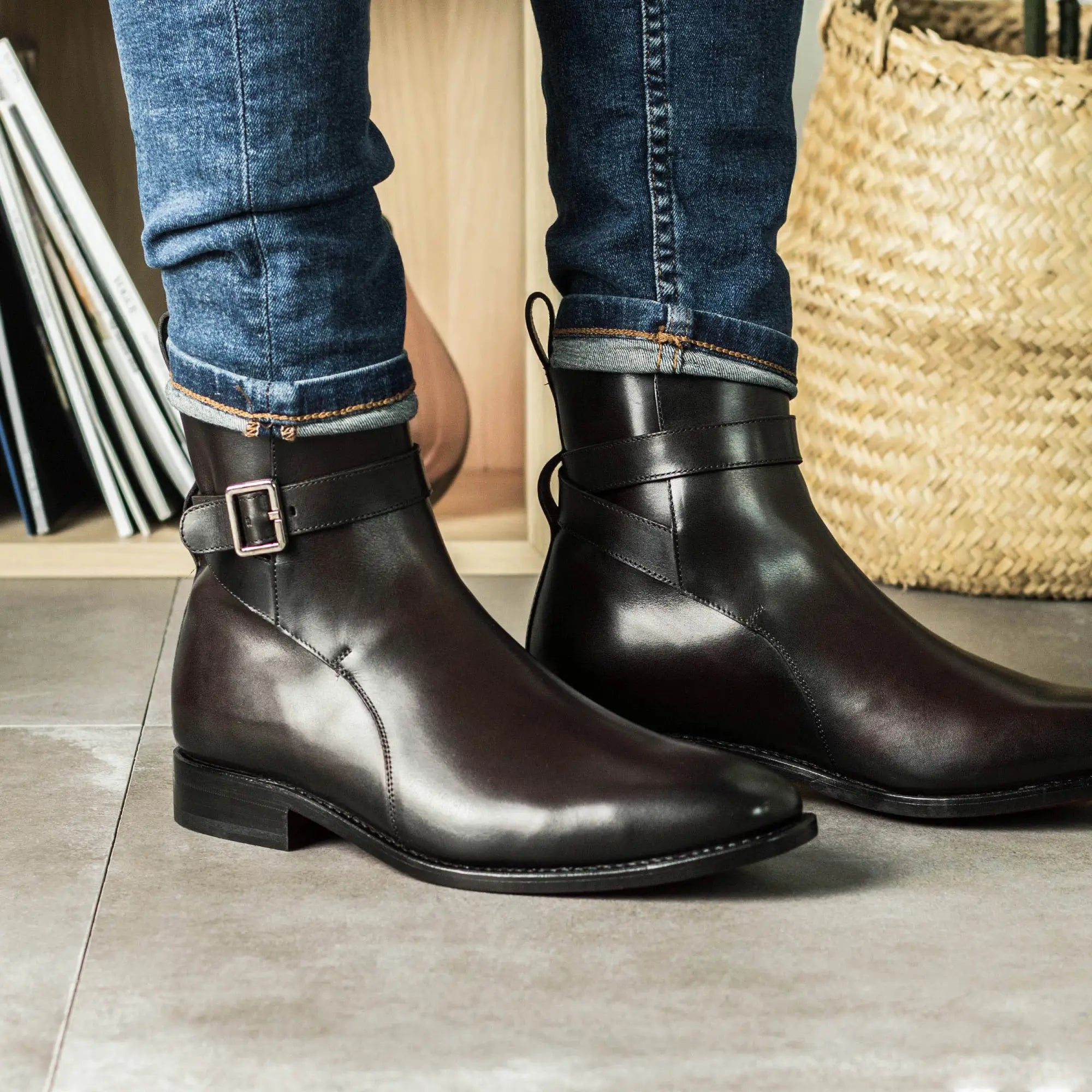 Leather ankle boots with buckle strap.