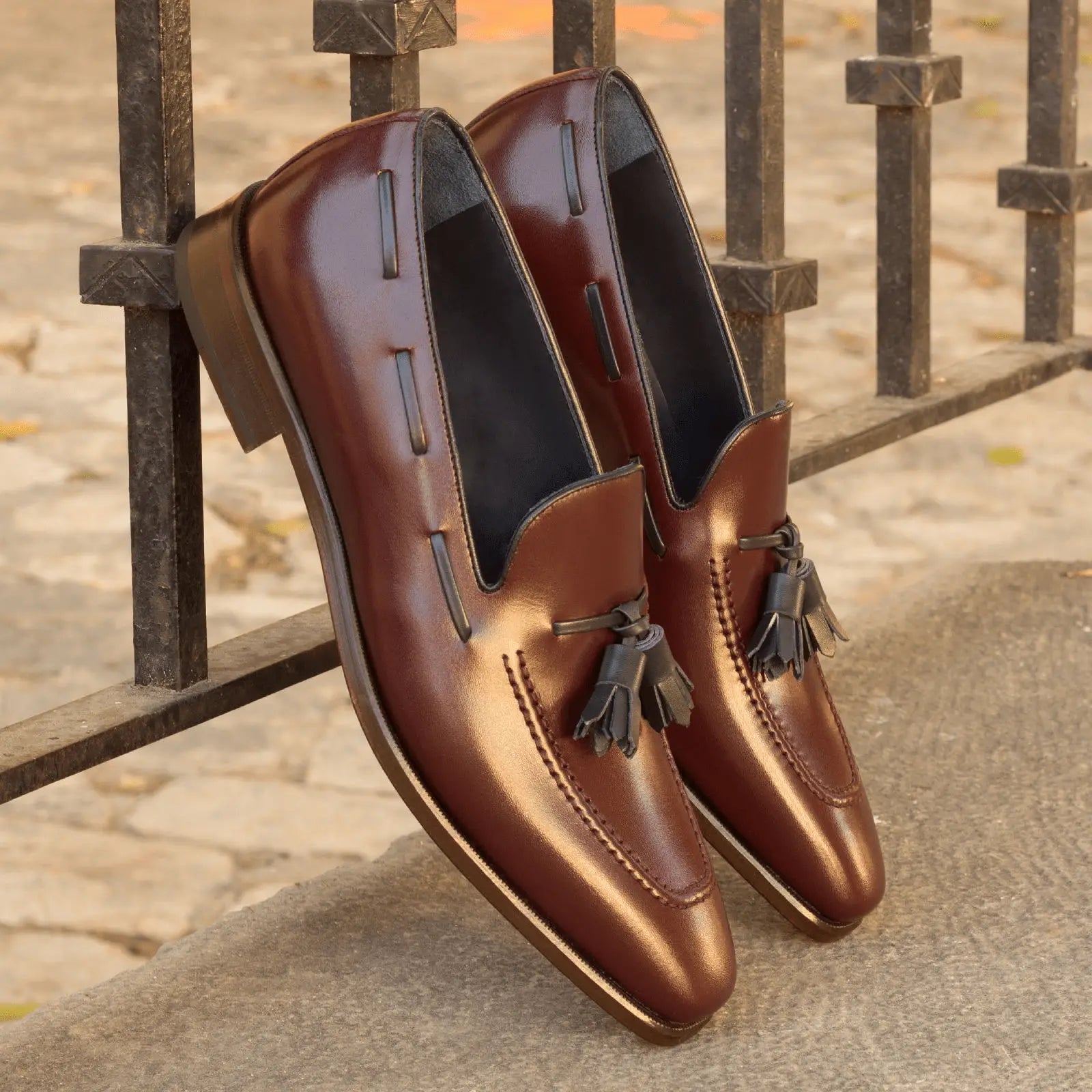 Pair of brown leather tassel loafers.