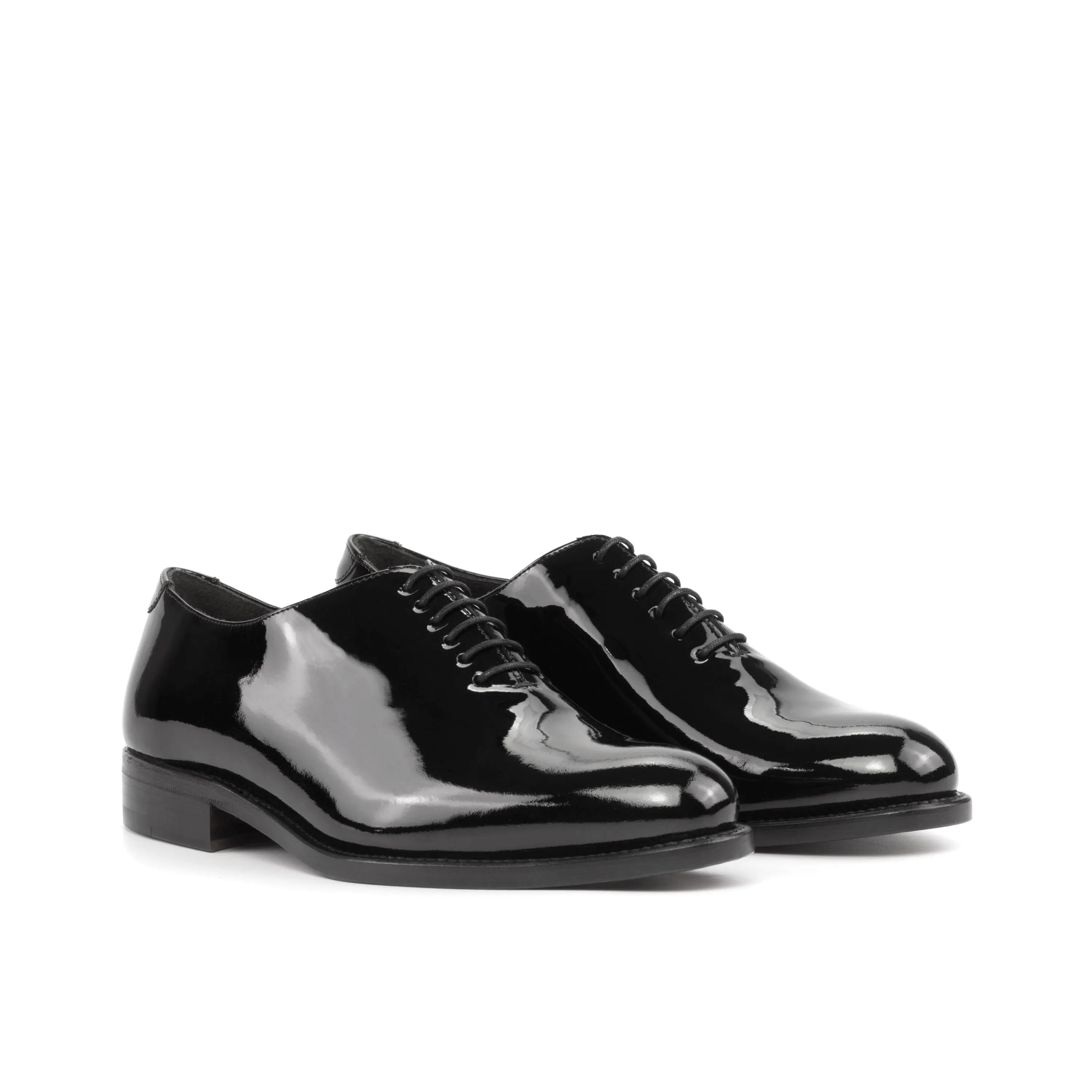Pair of shiny black 5908 Whole Cut Shoes, elegant cut patina dress shoes for formal occasions