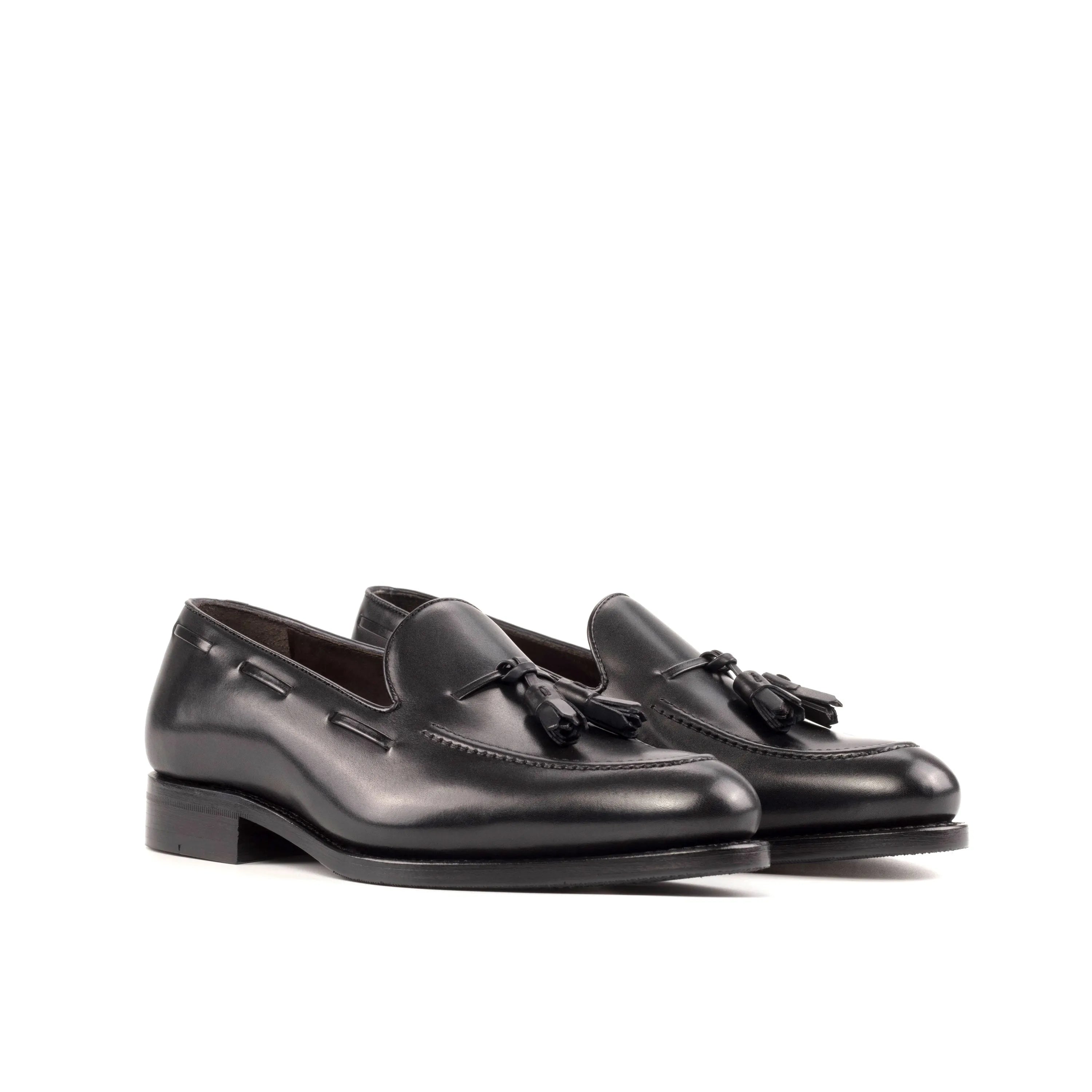 Pair of black leather tassel loafers from the 5911 Loafers collection, available for shipping