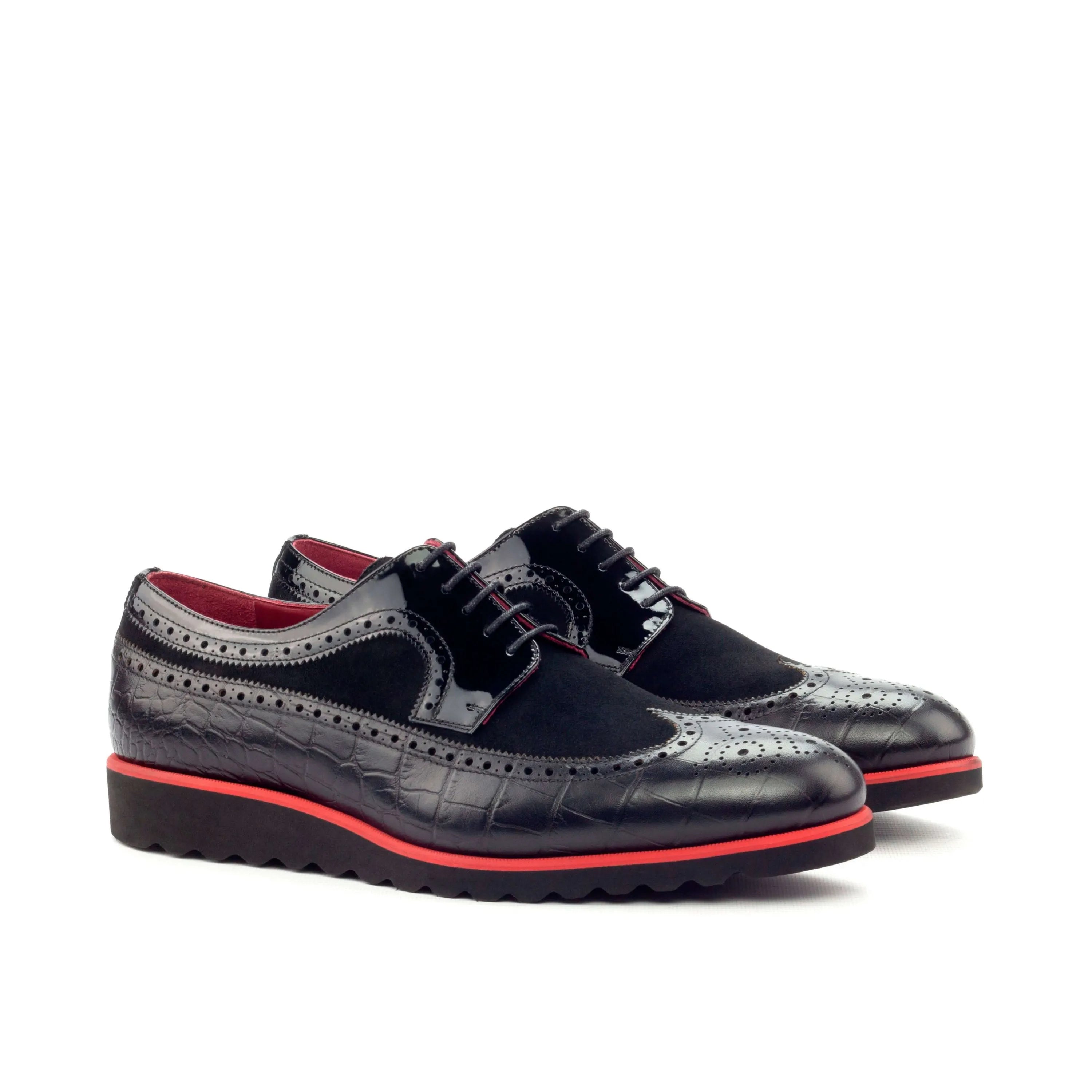 Black leather wingtip shoes, Abebe Longwing Blucher, showcasing elegant longwing patina