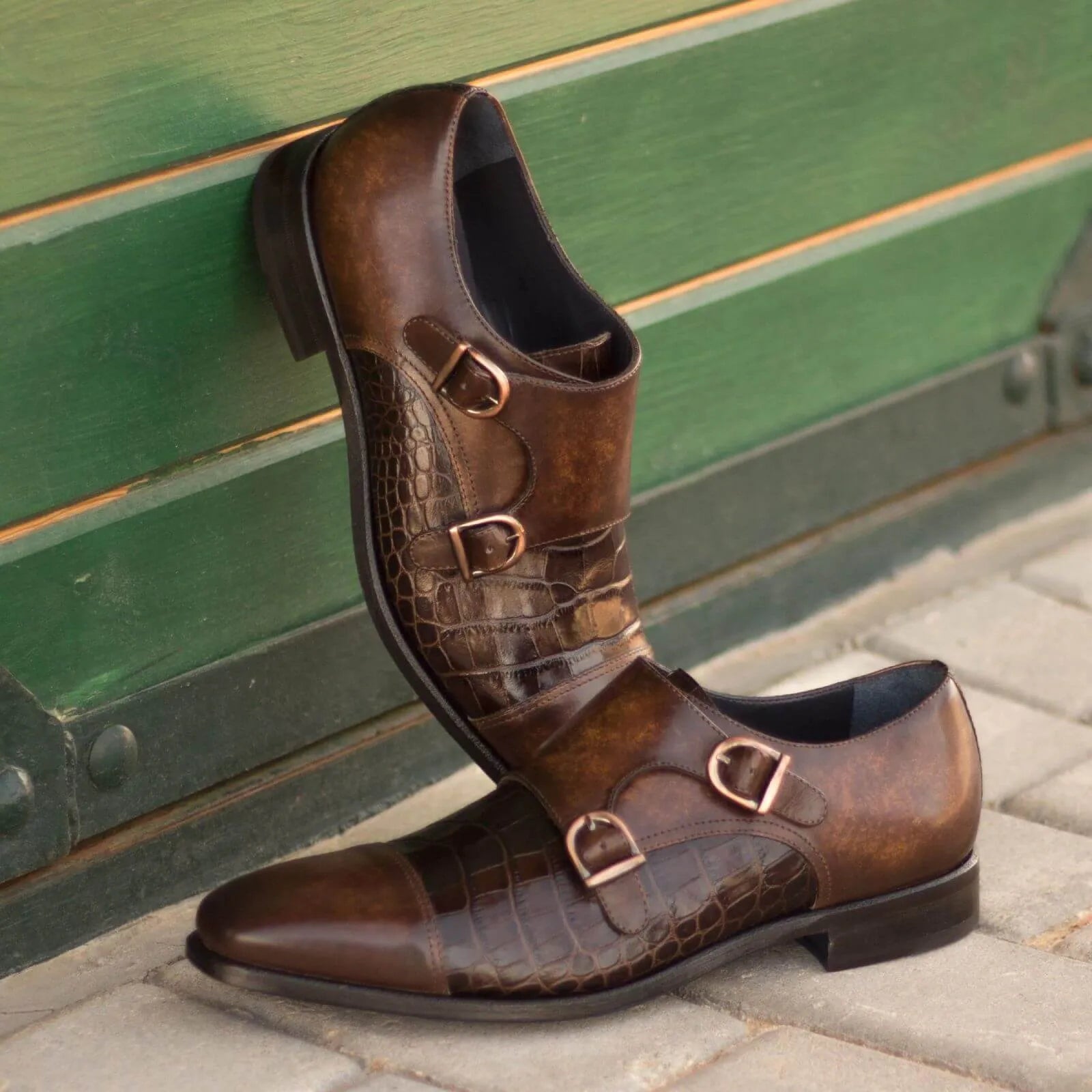 Brown leather Abraham Double Monk Patina shoes, showcasing elegant double monk strap design