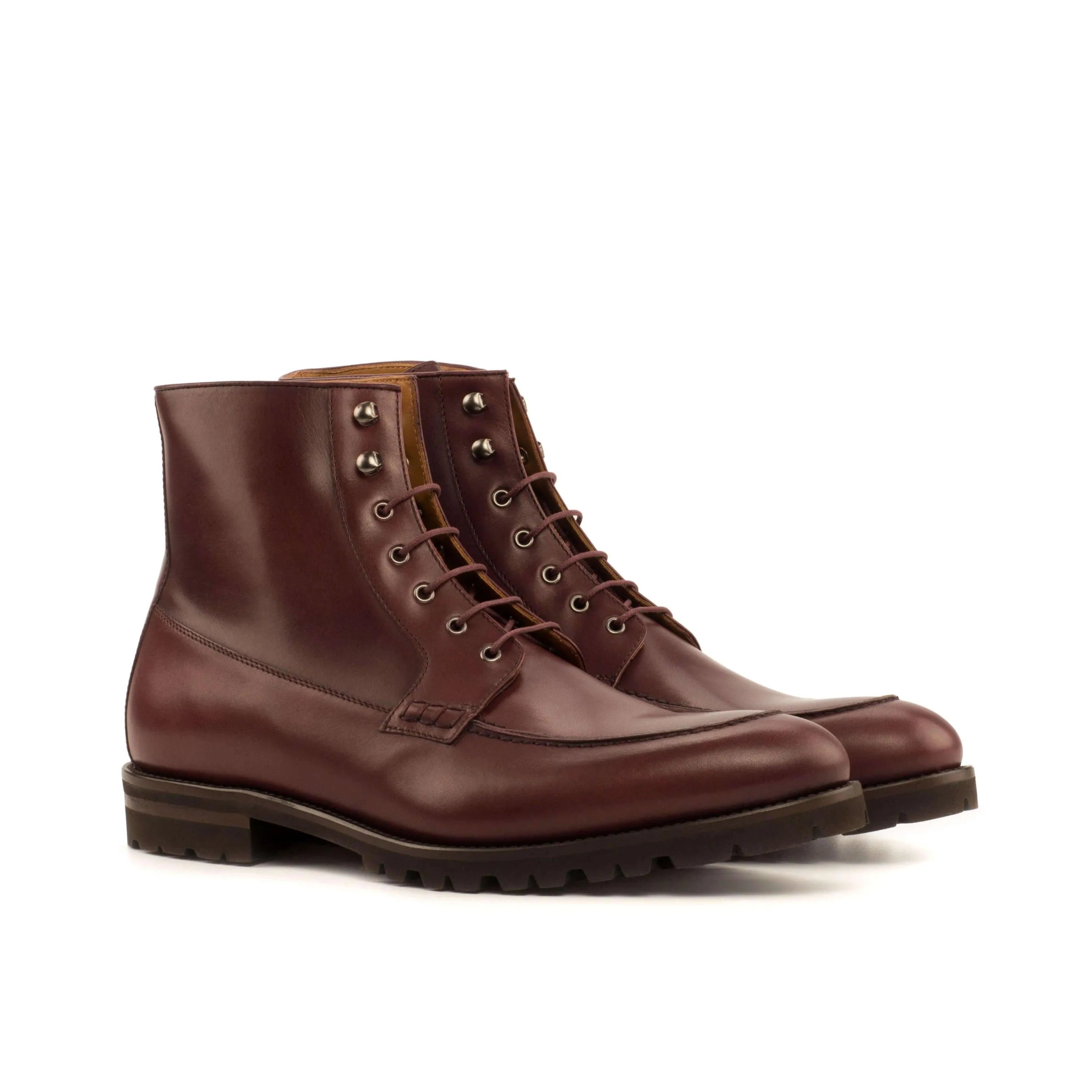 Pair of brown leather lace-up Abrilios Moc Boots II for stylish comfort and durability