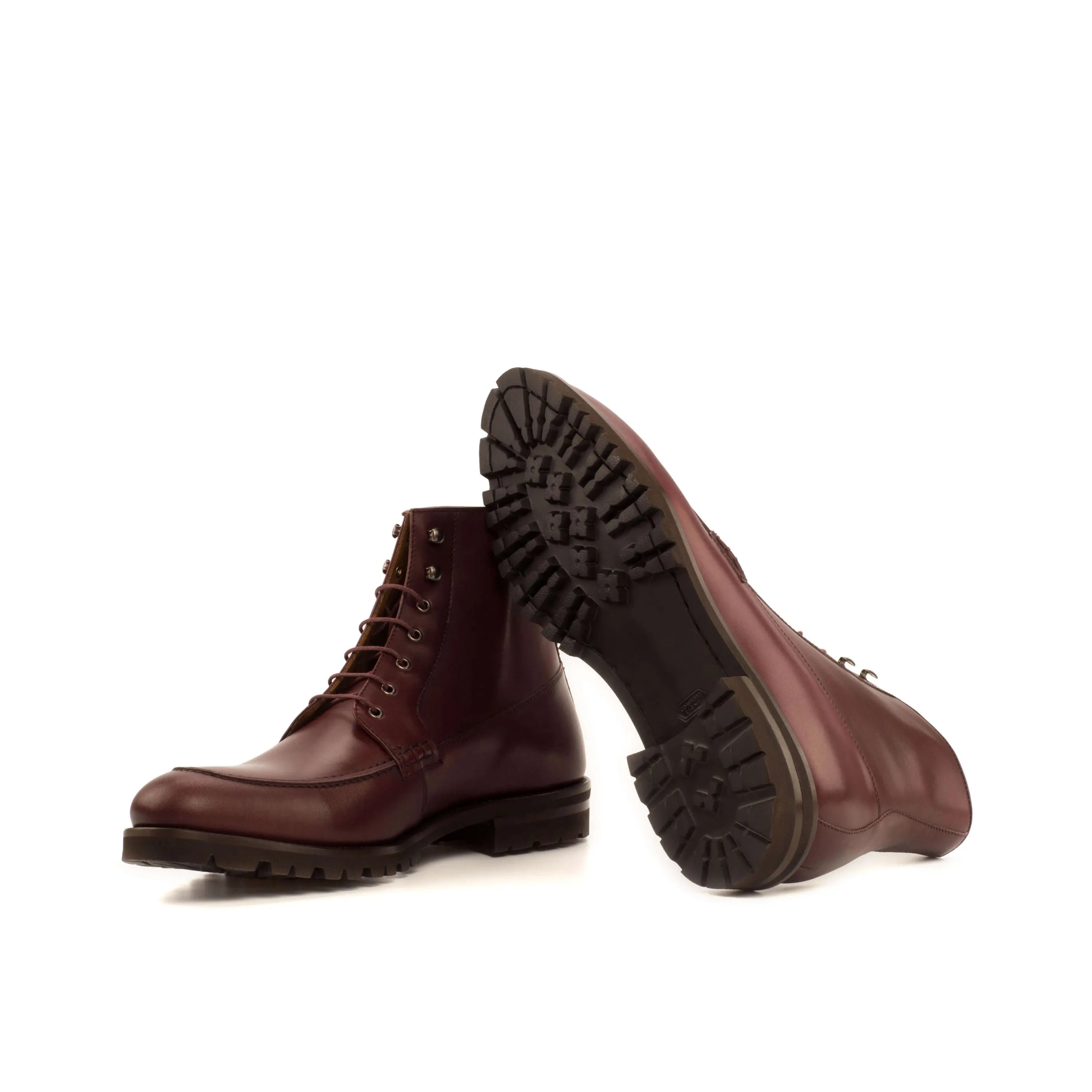 Brown leather lace-up boots from Abril.io, featuring the stylish Abril.io Moc Boot design