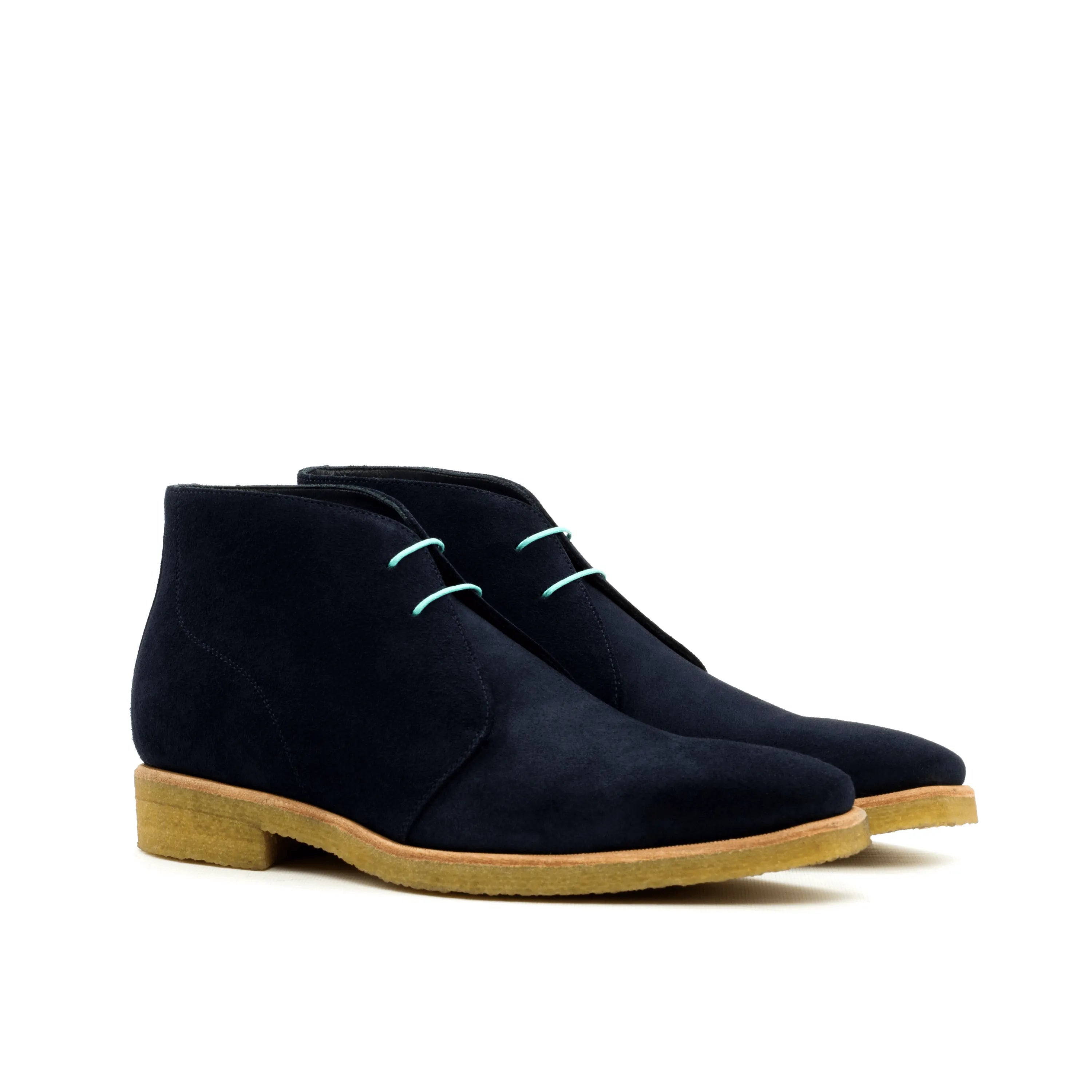 Pair of black suede Adamo Chukka boots for stylish and versatile footwear options
