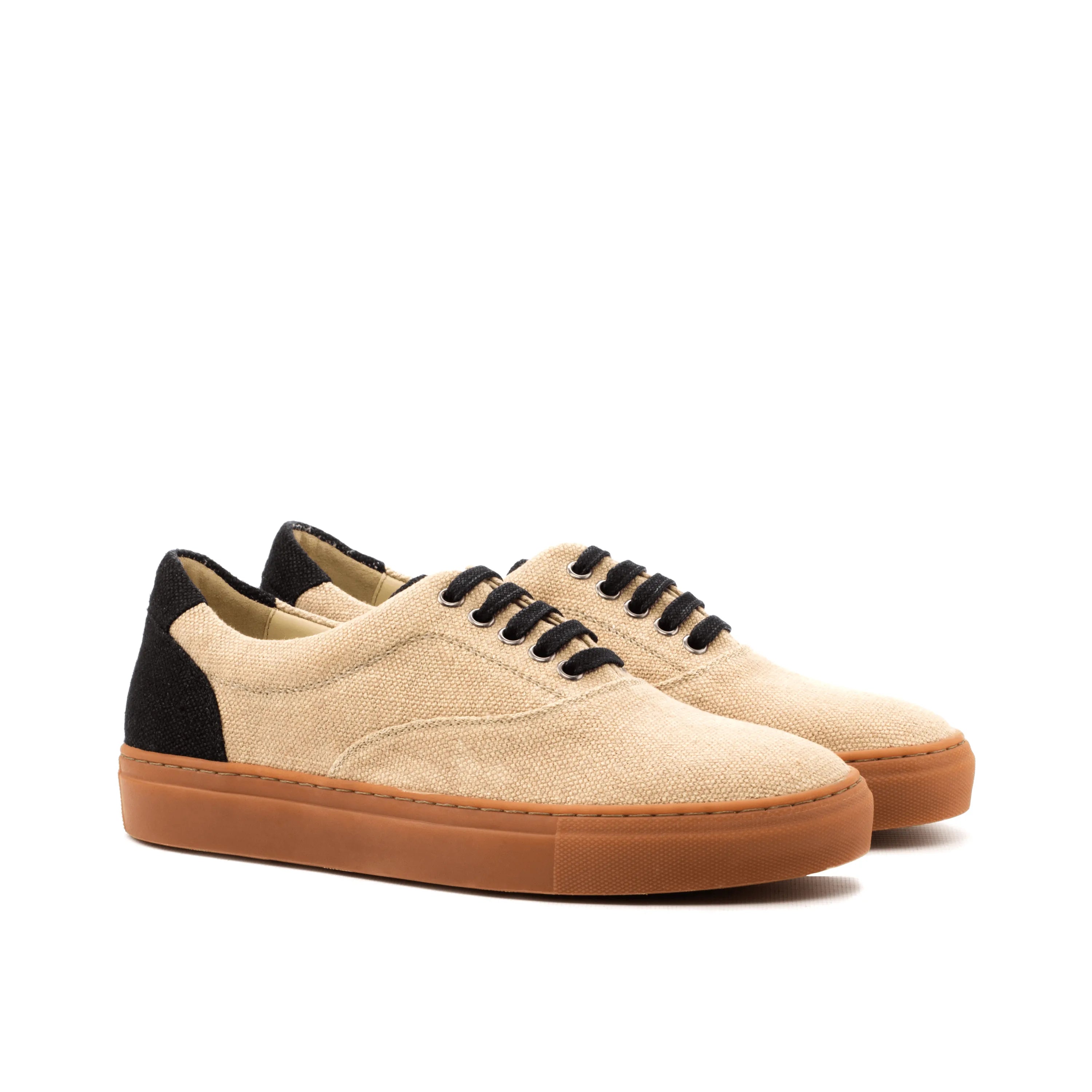 Beige Adria Top Sider Sneaker with black accents, a stylish laceless cupsole trainer