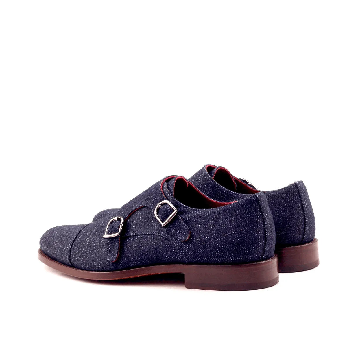 Pair of blue denim shoes from Aesop Double Monk II collection, featuring double monk style