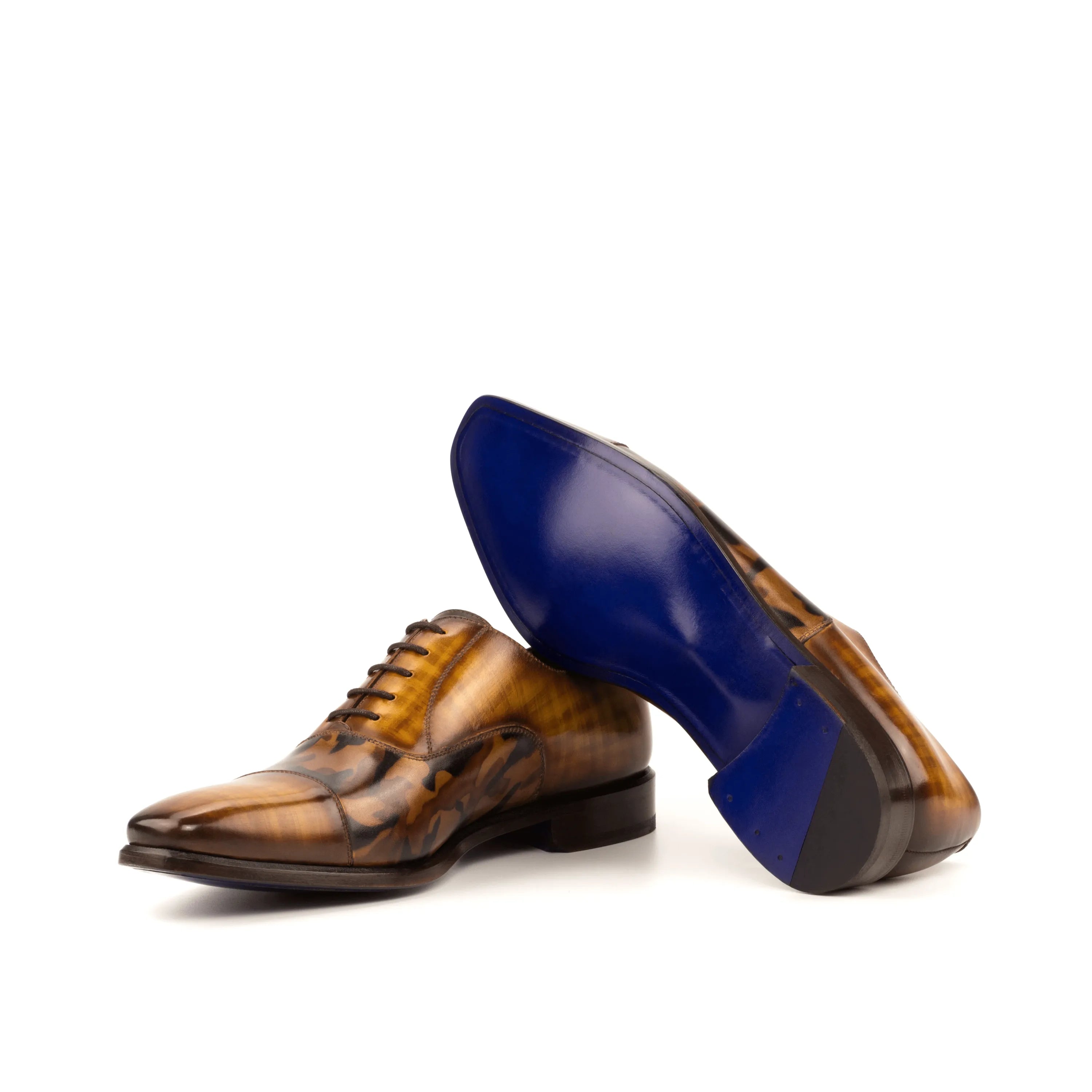 Brown leather Agent Oxford Patina shoes featuring a classic longwing blucher design