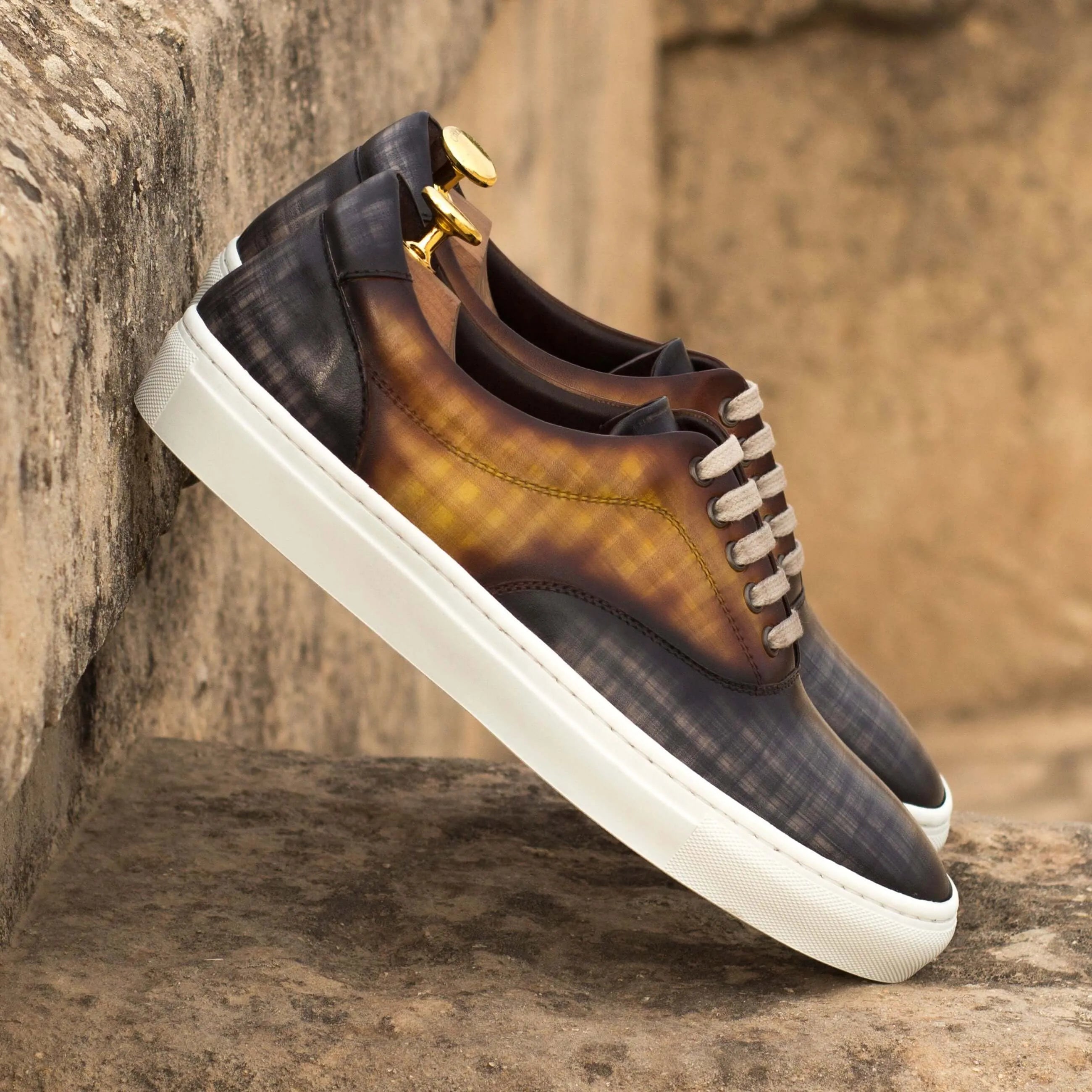 Leather sneakers with white soles, featuring the stylish Alex Top Sider Patina Sneaker design