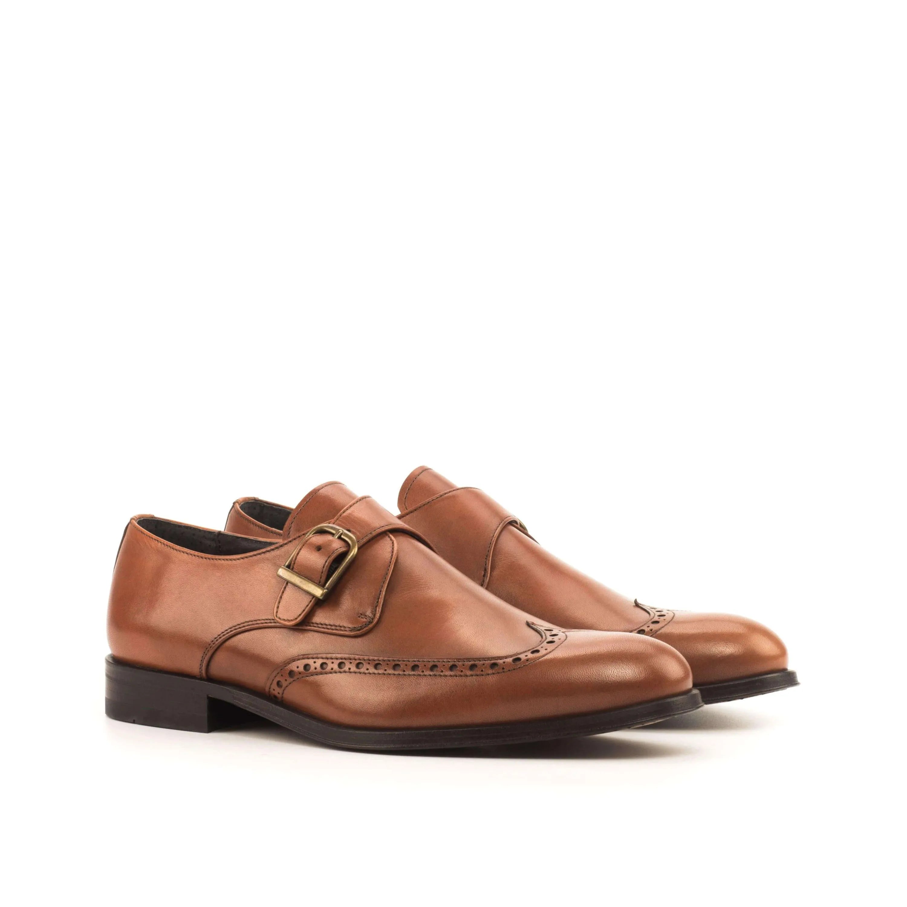 Pair of brown leather Alo Single Monk Shoes II featuring a rounded toe design