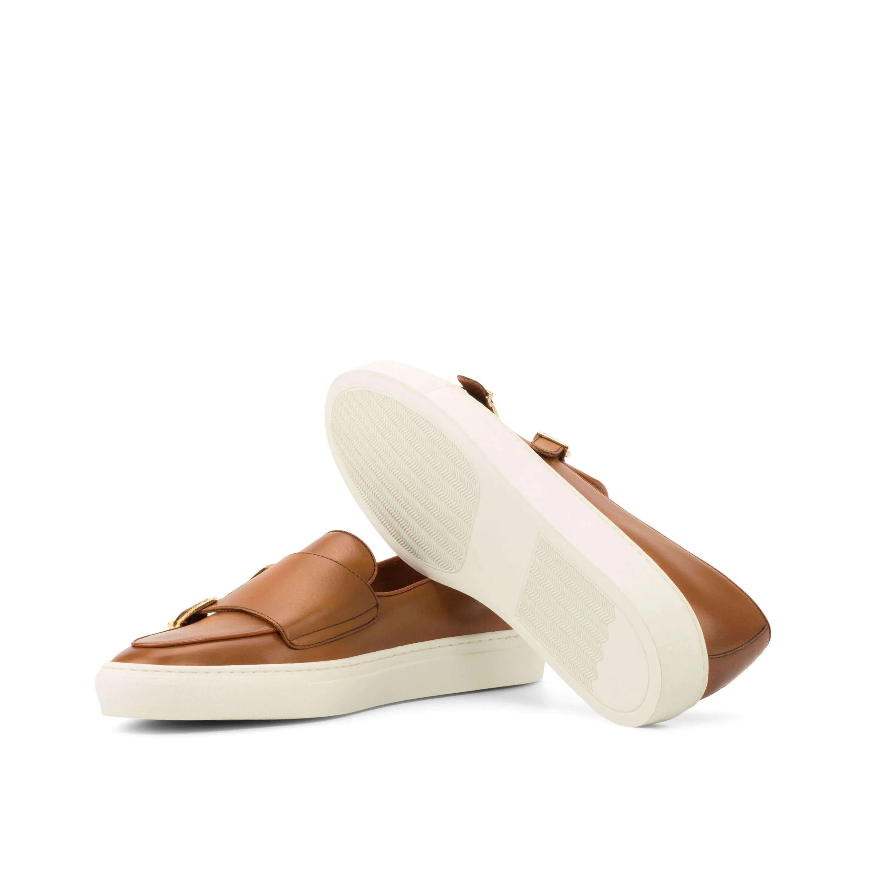 Brown leather slip-on sneakers from Alriva Monk Sneaker II rest on a neutral background