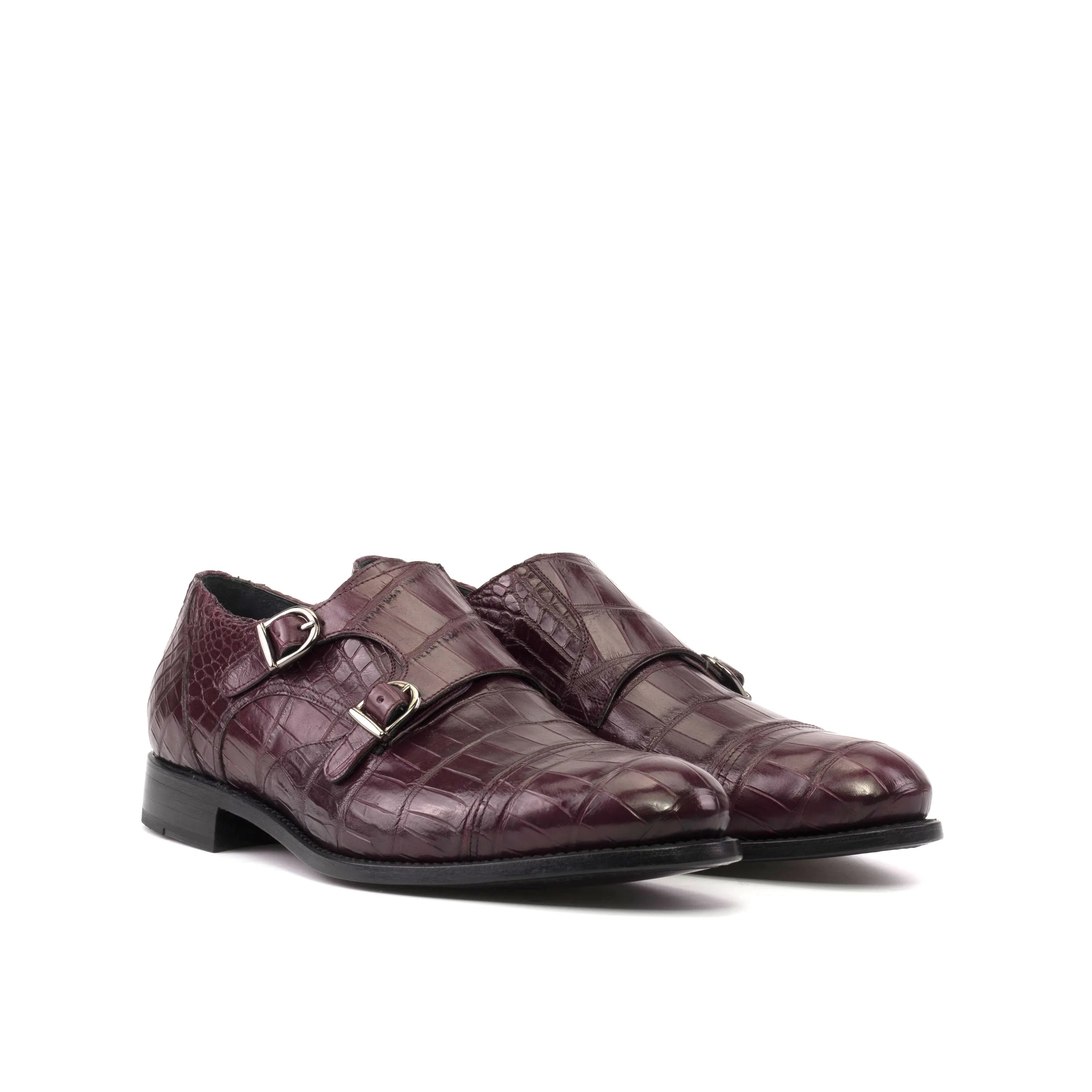 Pair of burgundy crocodile-patterned Amiri Alligator Double Monk strap shoes