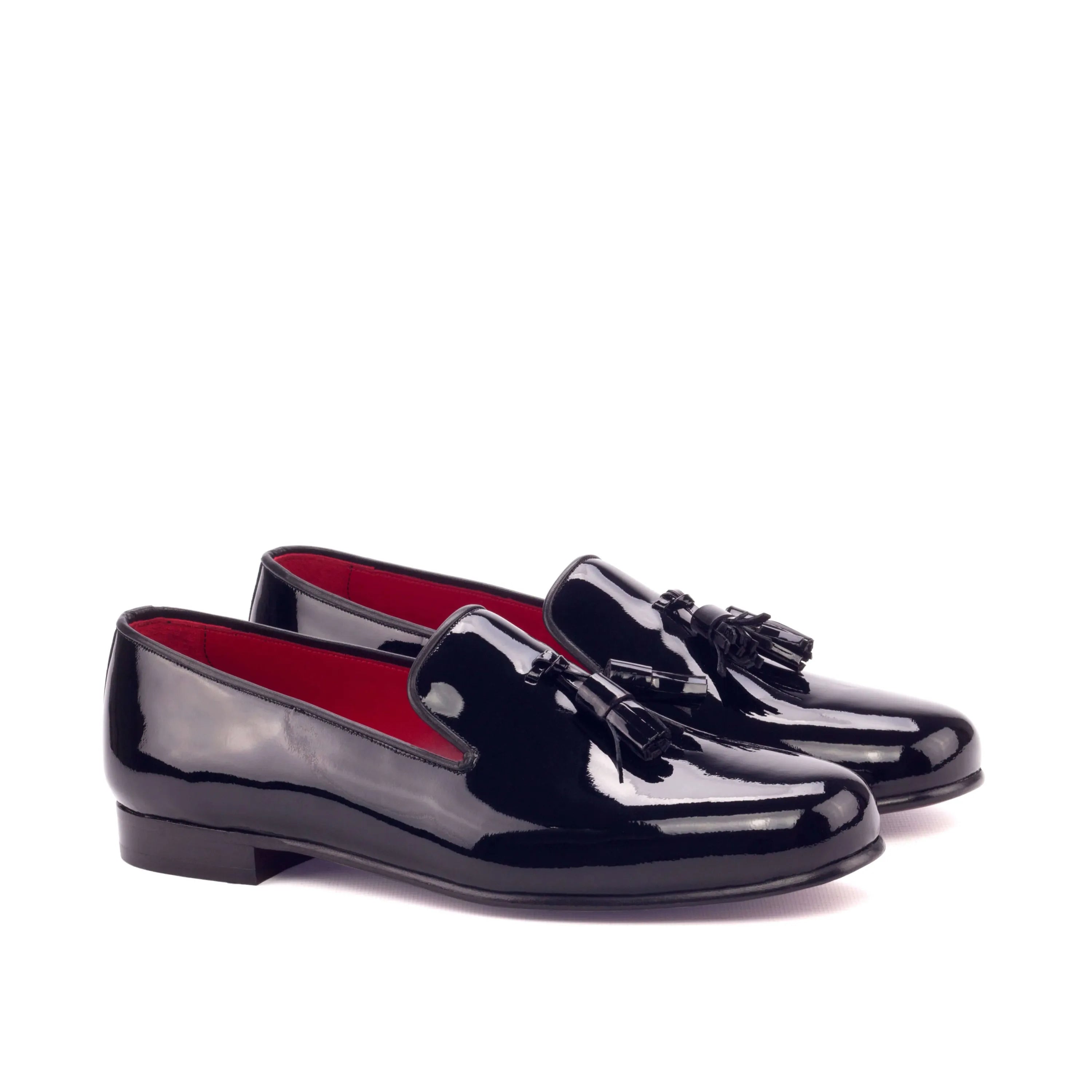 Pair of shiny black tassel loafers from the Amuso Wellington slip collection
