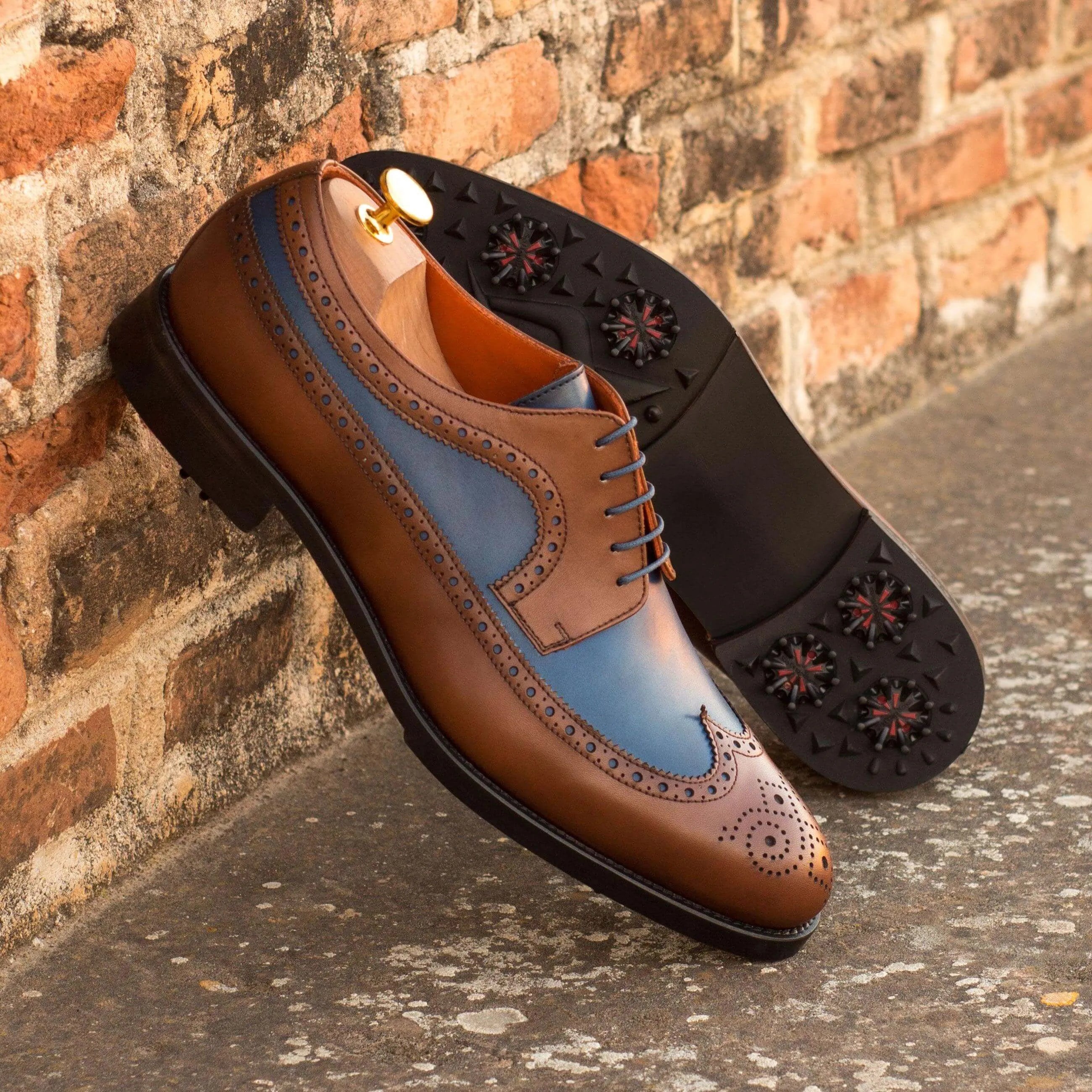 Two-tone brown and blue Andy Longwing Blucher golf shoes II showcasing long wingtip design