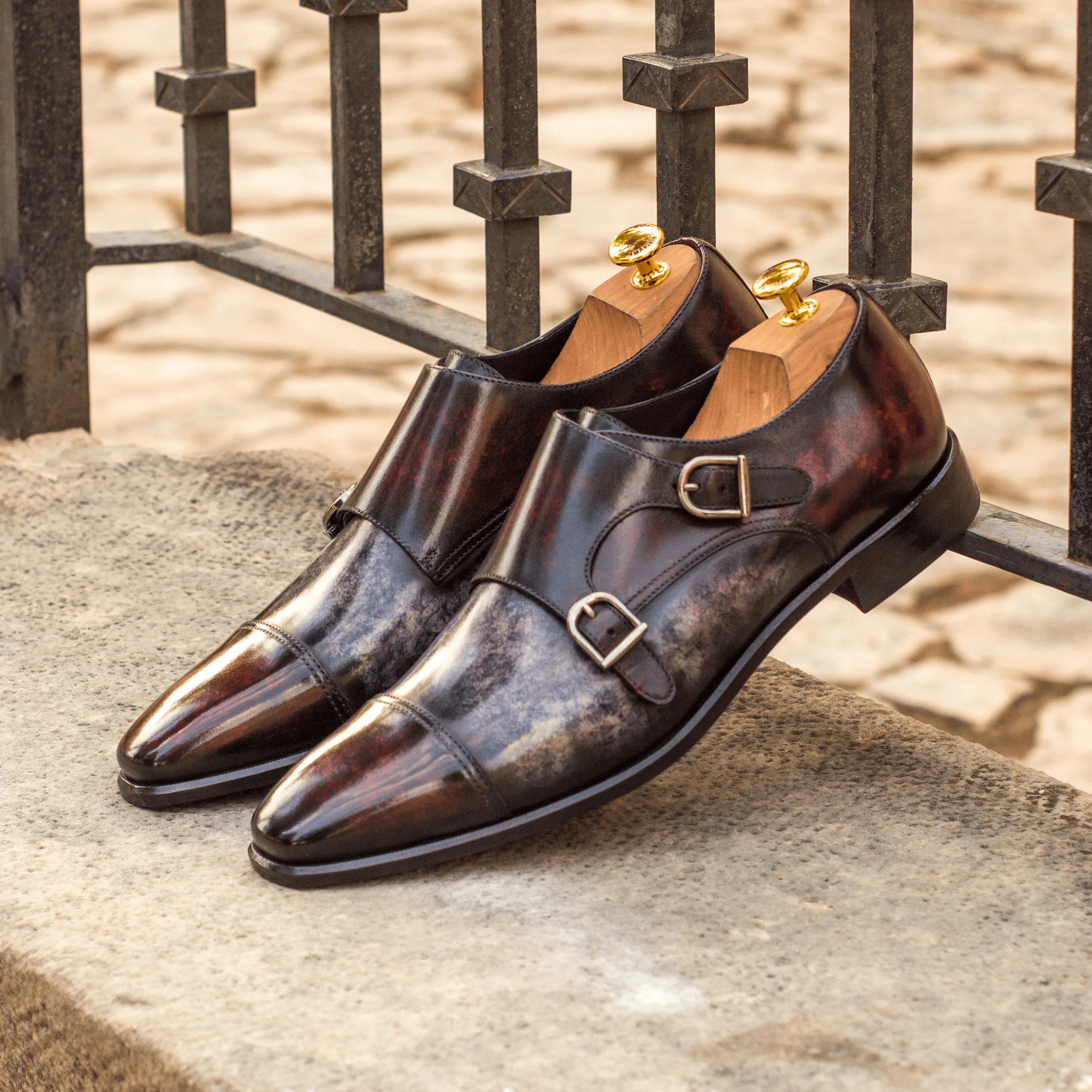 Pair of ATL Double Monk Patina II shoes featuring a rich crust patina finish