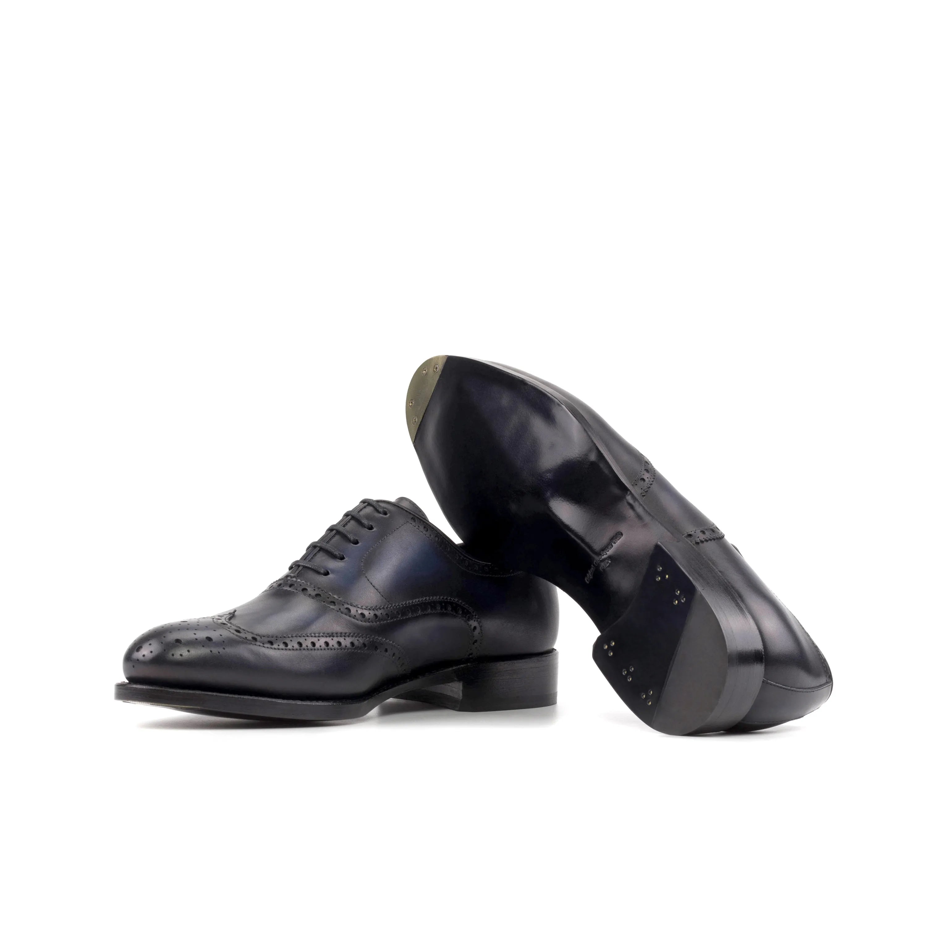 Pair of black leather Aurora Longwing Blucher shoes with elegant wingtip design