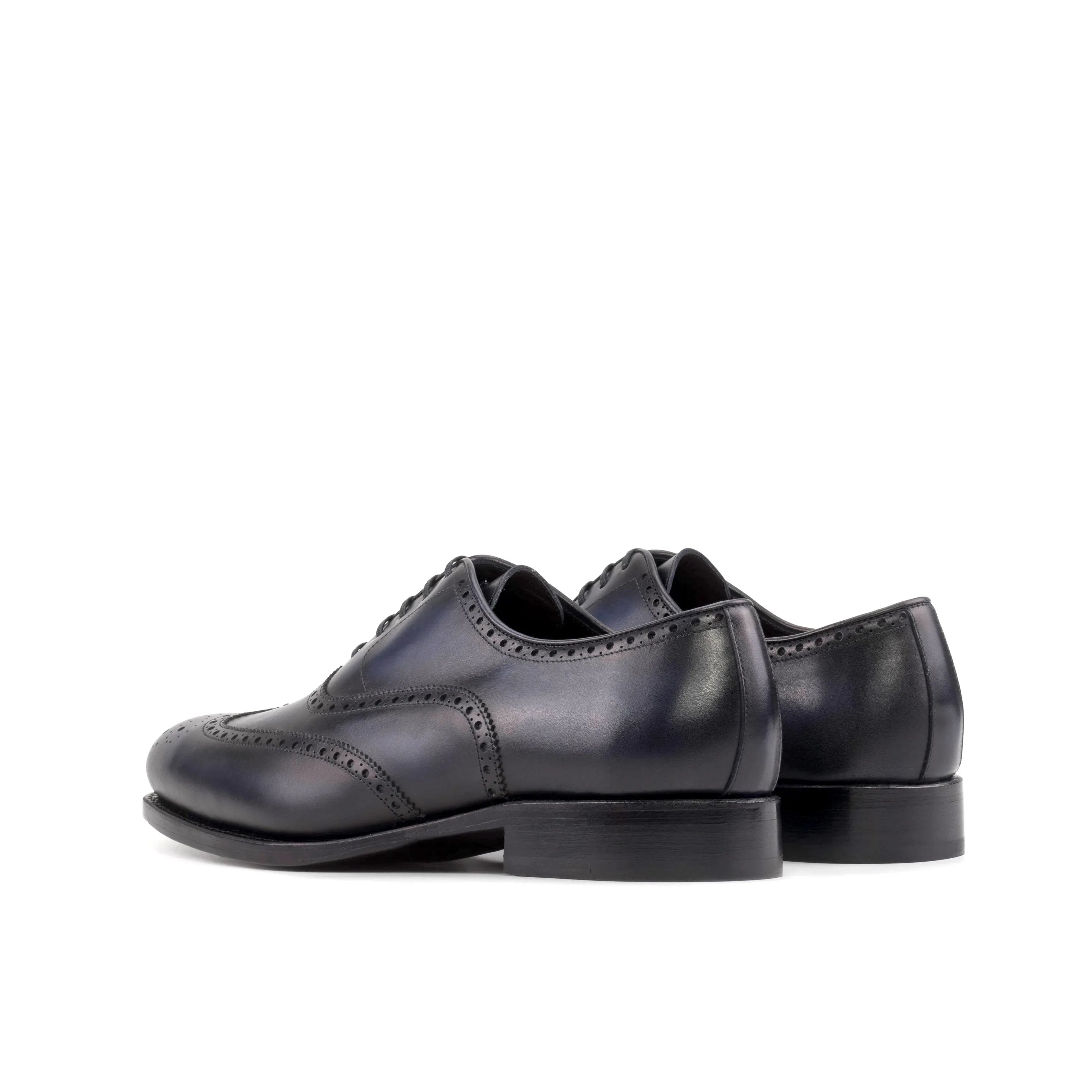 Pair of blue leather Aurora Longwing Blucher shoes showcasing elegant craftsmanship