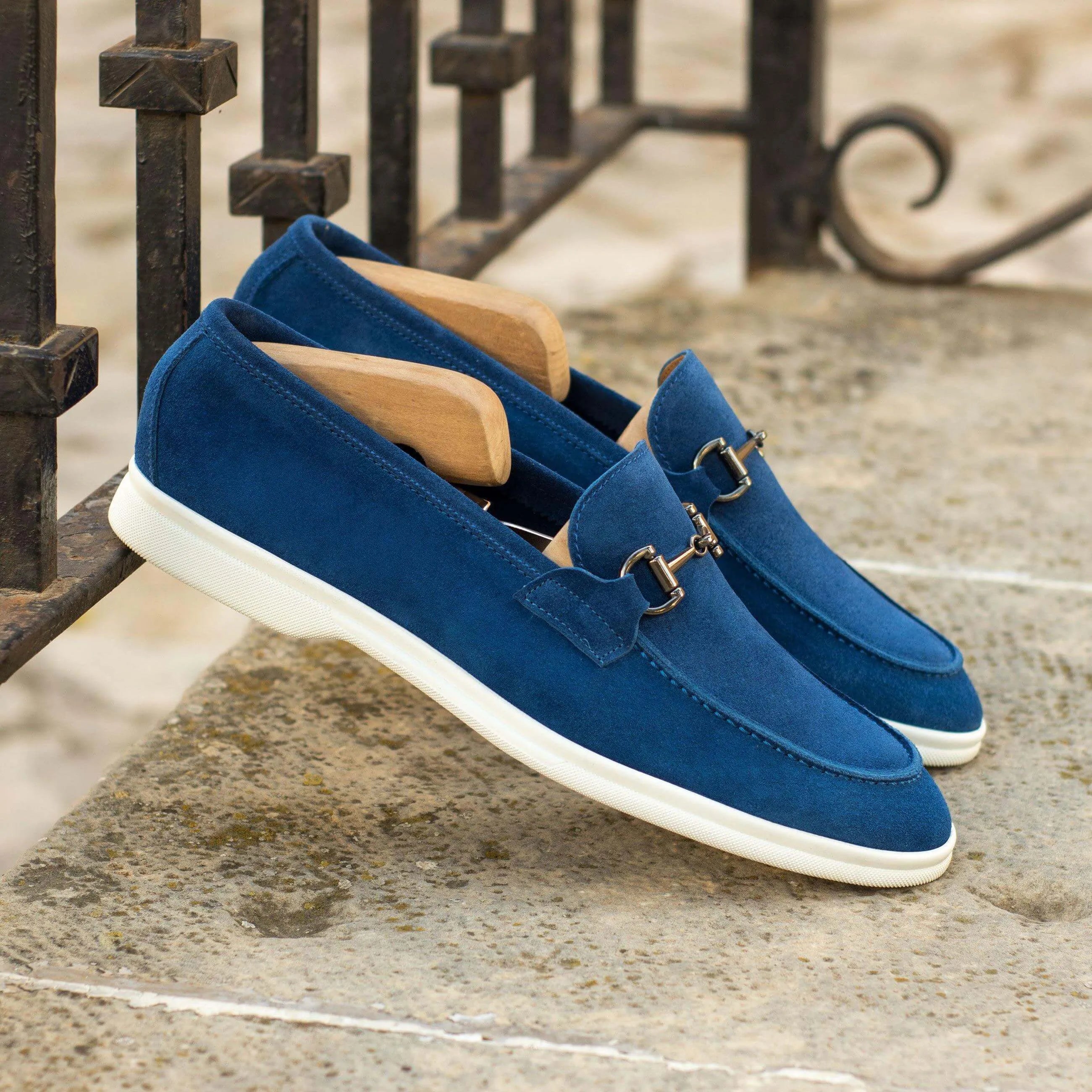 Blue suede Bahia Moc Flex Shoes II with white soles for stylish comfort and versatility