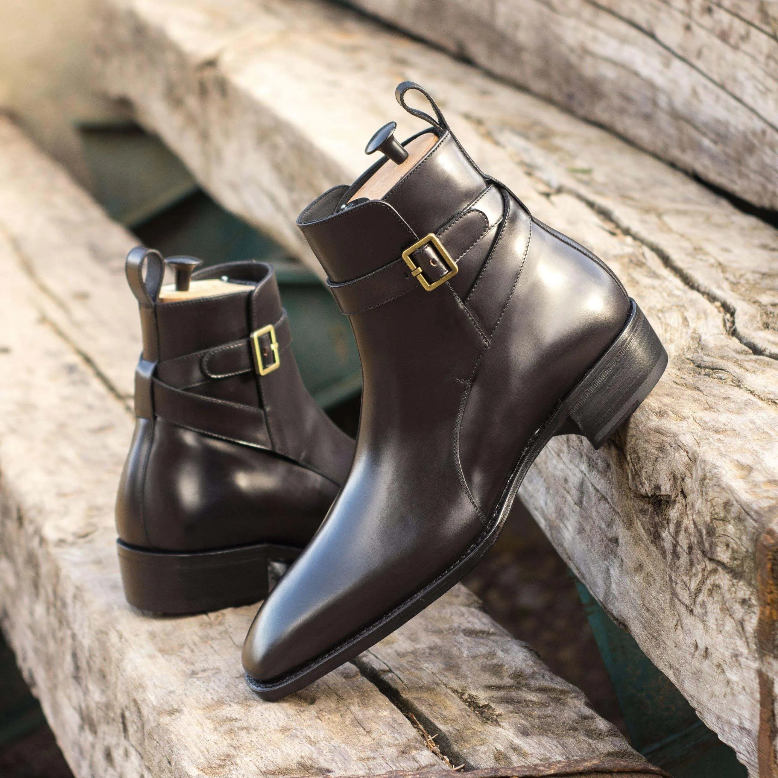 Brown leather Beckam Jodhpur Boots featuring gold buckles for a stylish finish