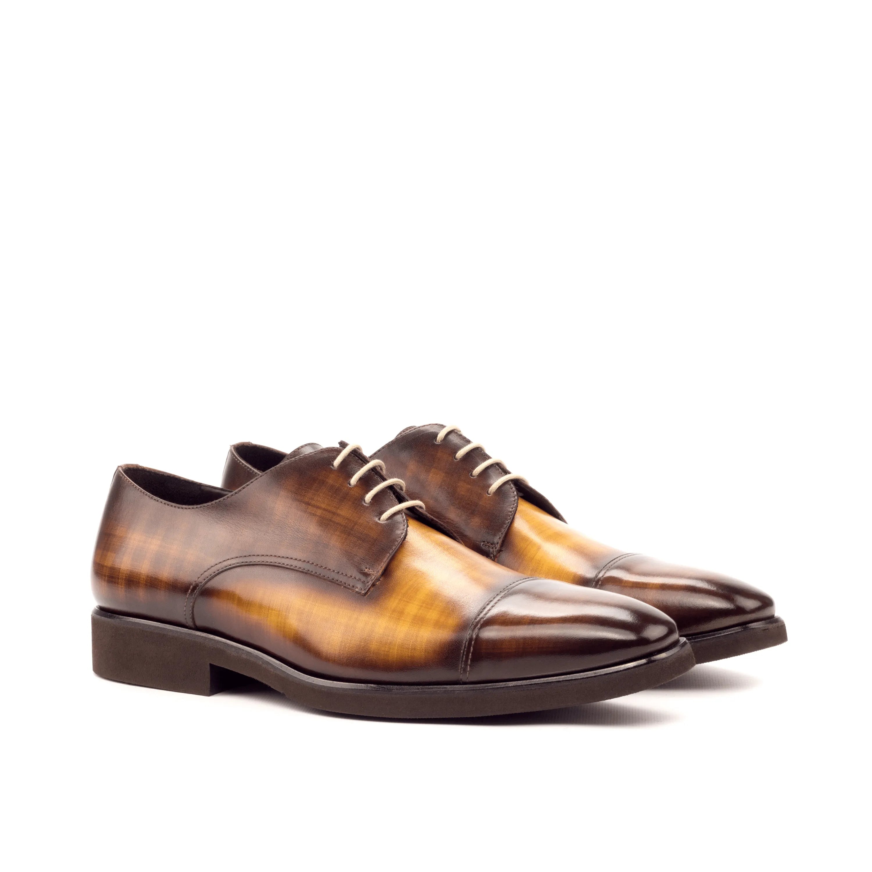 Brown leather dress shoes, Belem Patina Derby, featuring a rich crust patina finish