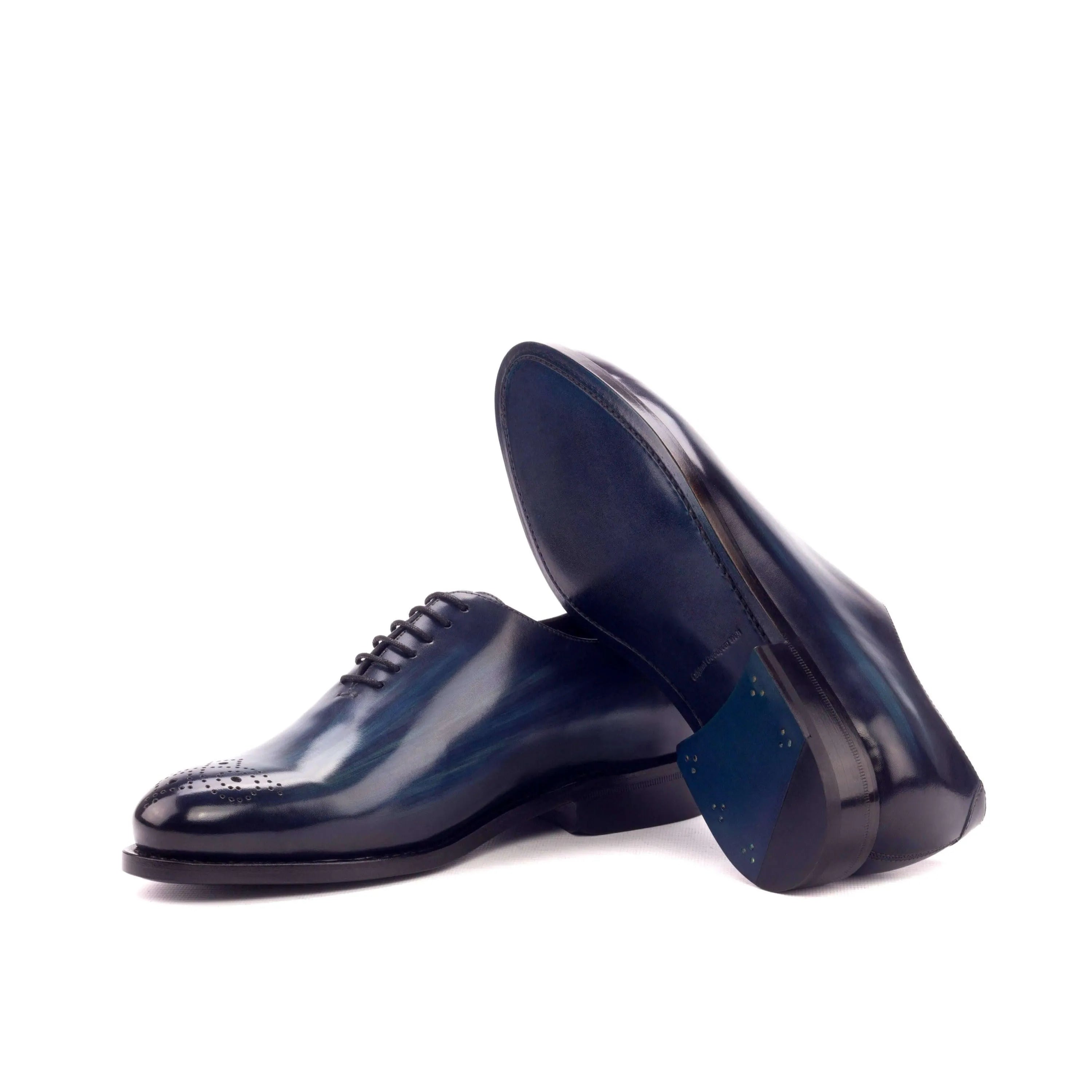 Pair of blue leather dress shoes from Bluemoon Wholecut Patina II collection