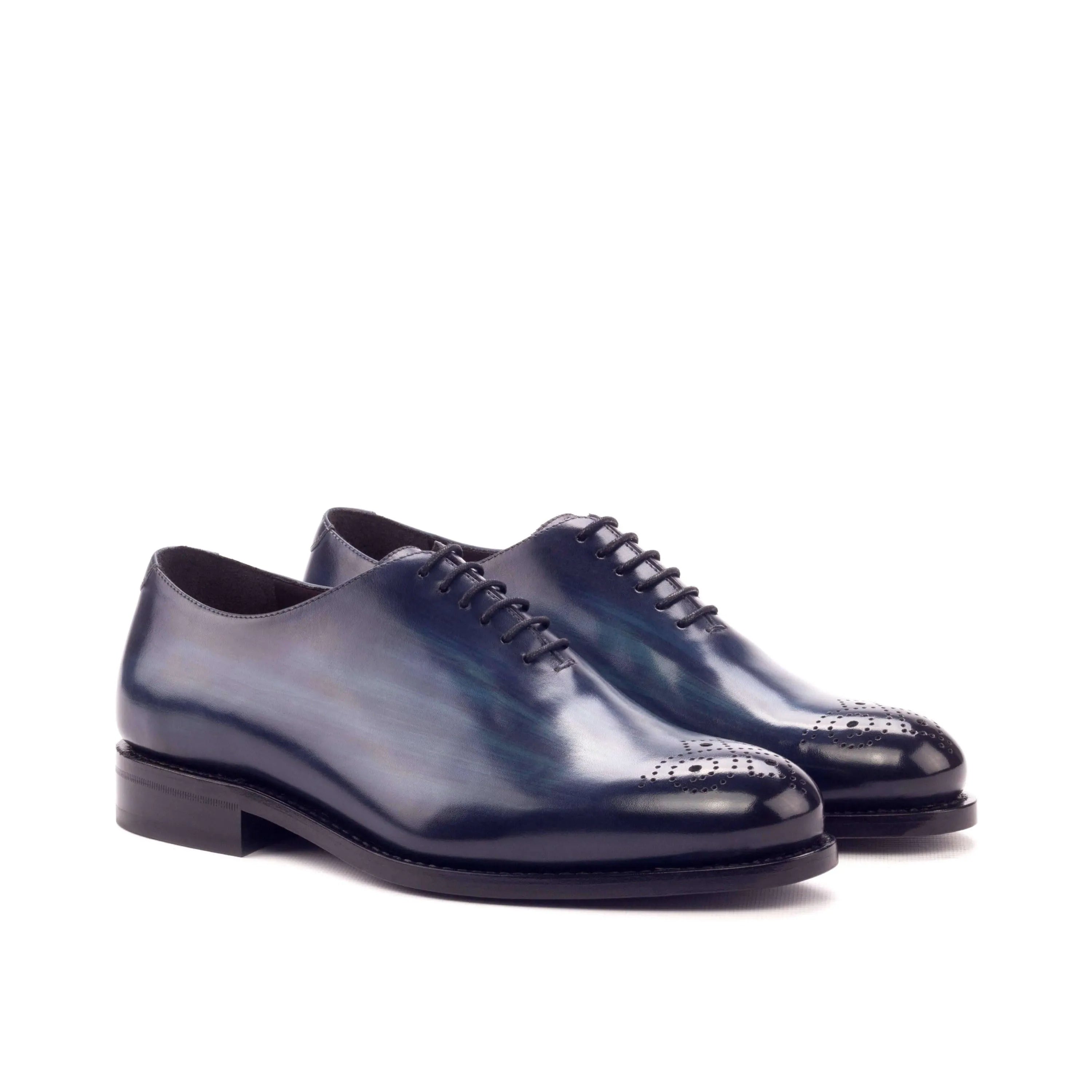 Pair of blue leather dress shoes from Bluemoon Wholecut Patina II collection