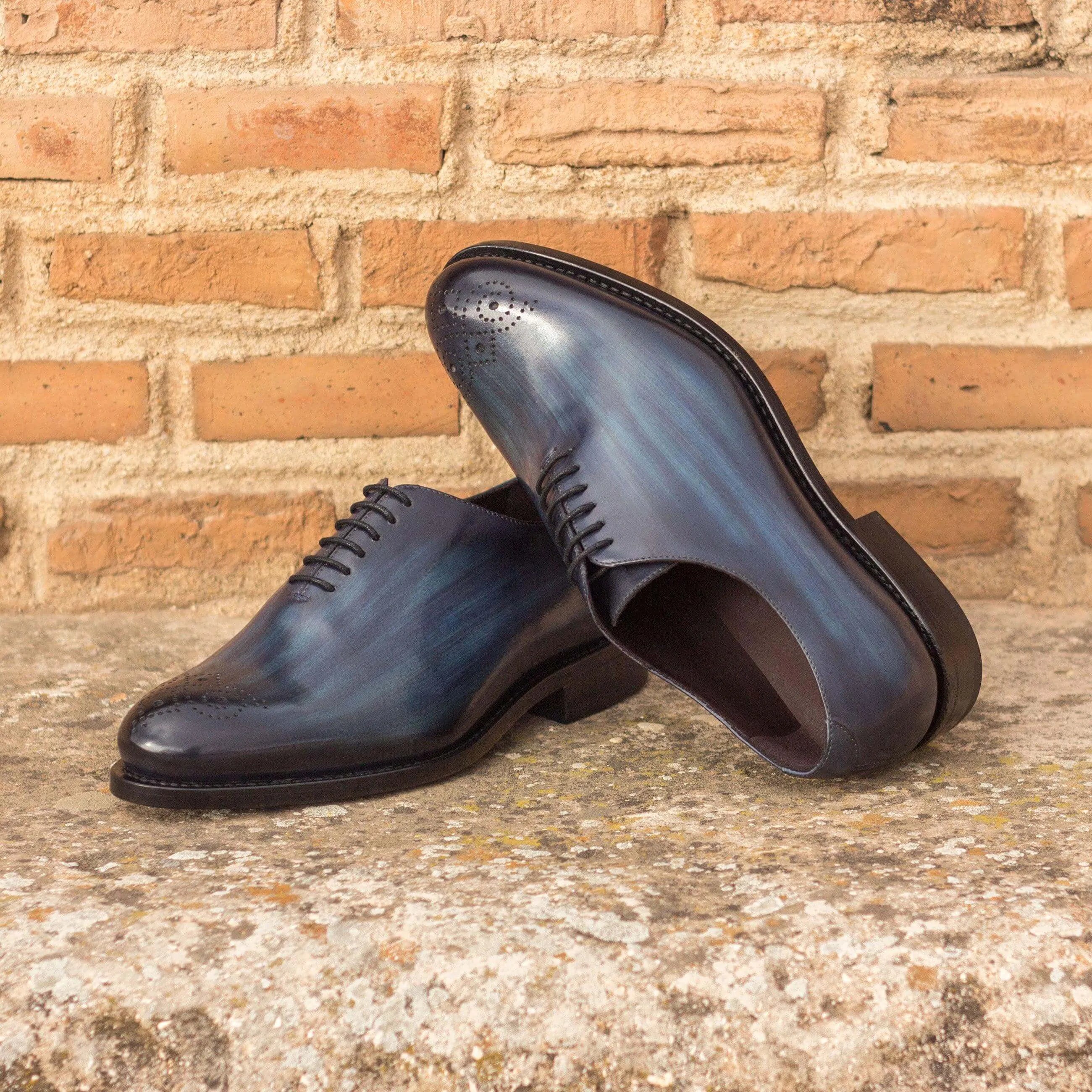 Blue leather dress shoes featuring Bluemoon wholecut patina design for elegant style