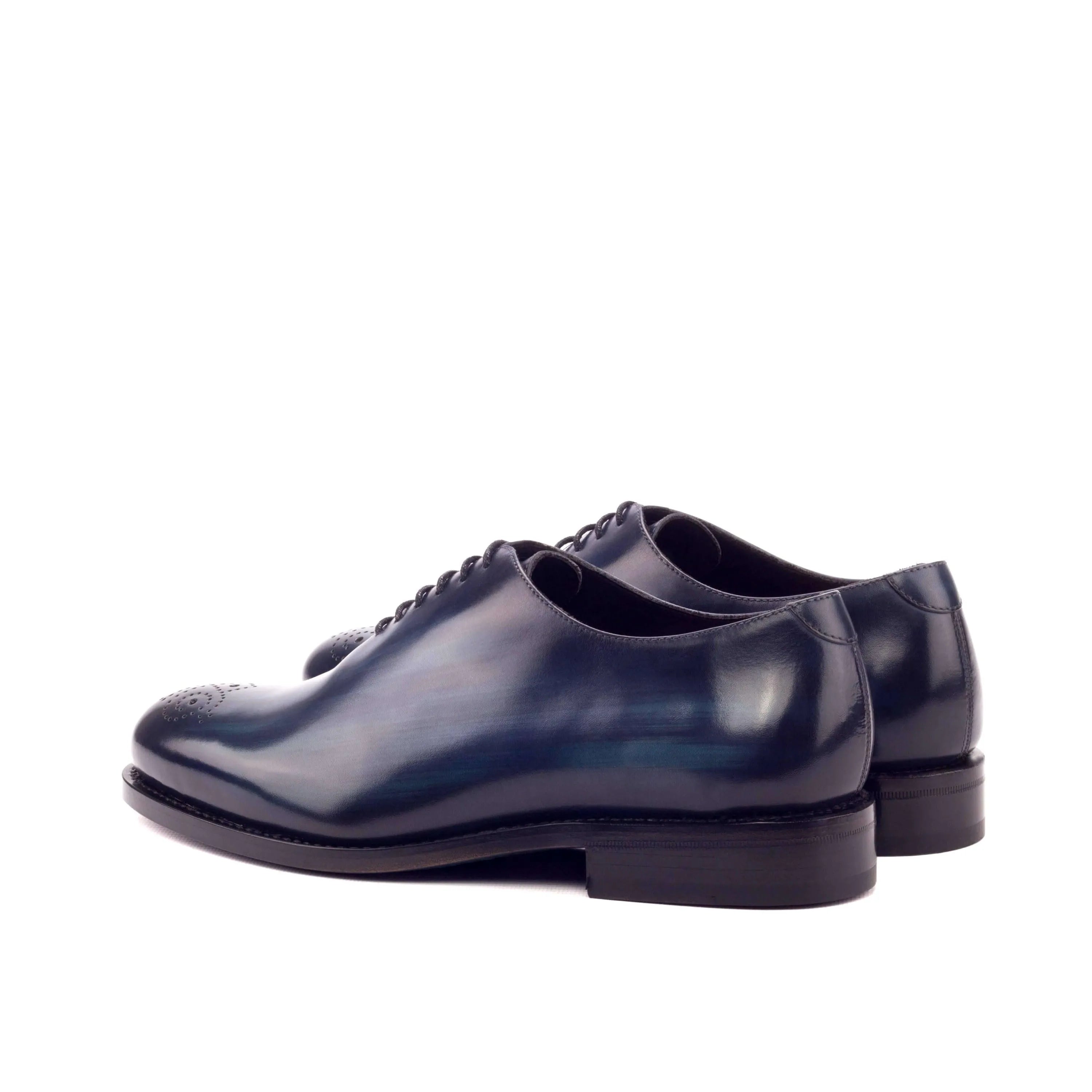 Pair of blue leather dress shoes from Bluemoon Wholecut Patina collection