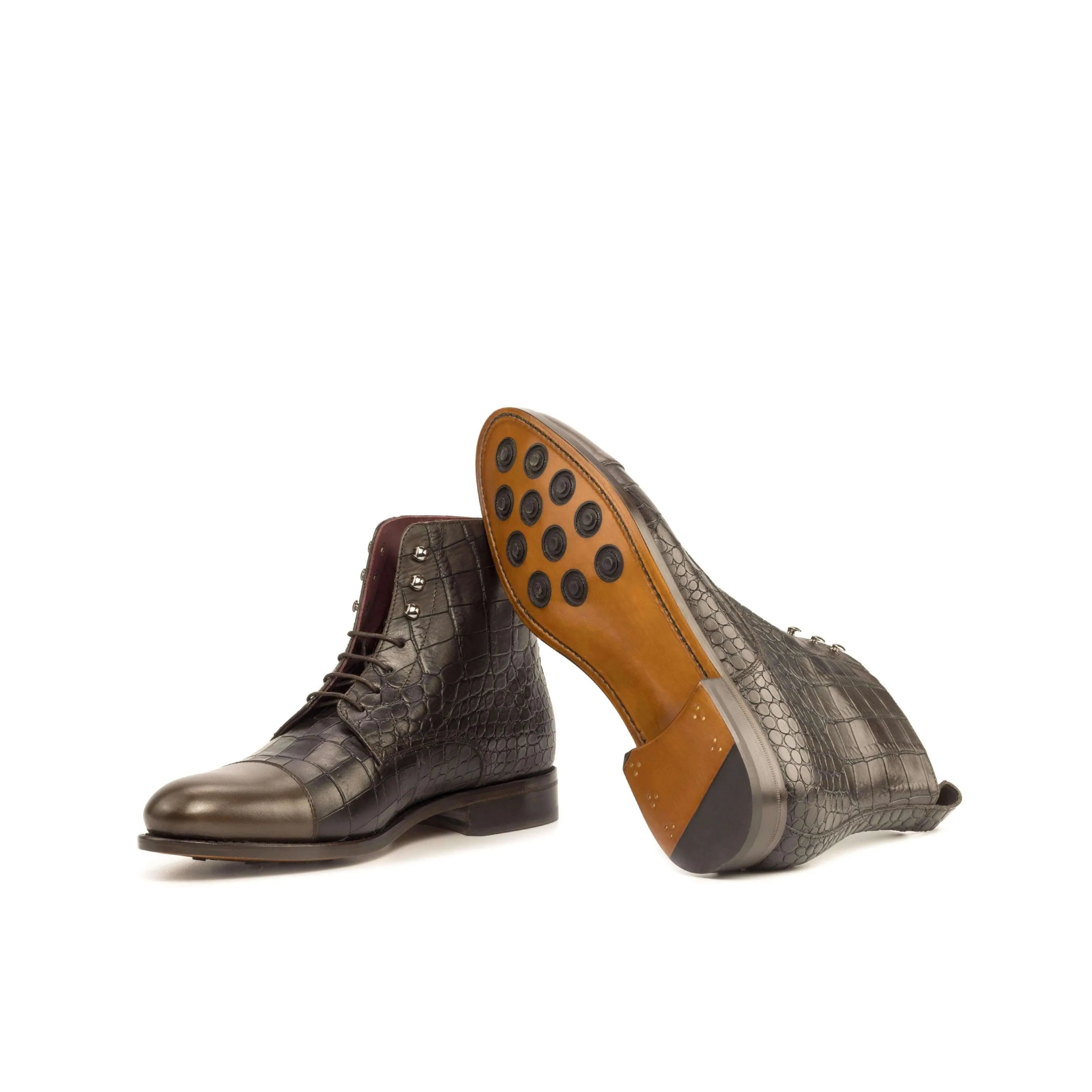 Pair of dark brown painted Bobies Jumper Boots II with crocodile-patterned leather