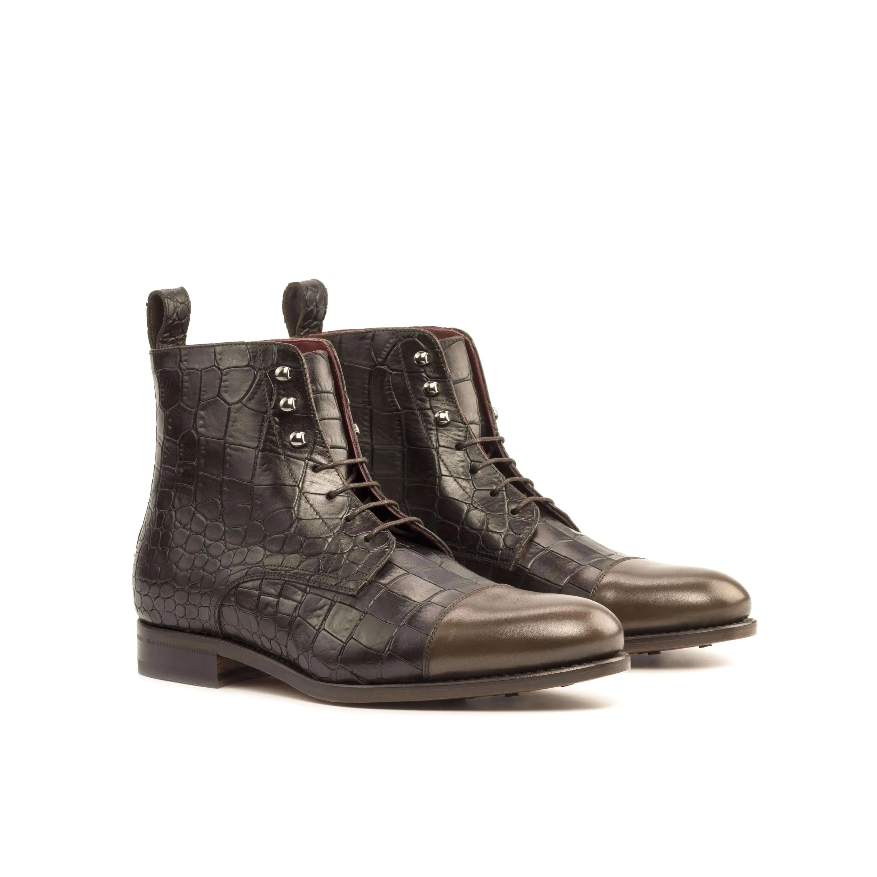 Dark brown painted Bobies Jumper Boots II featuring a crocodile-patterned leather design