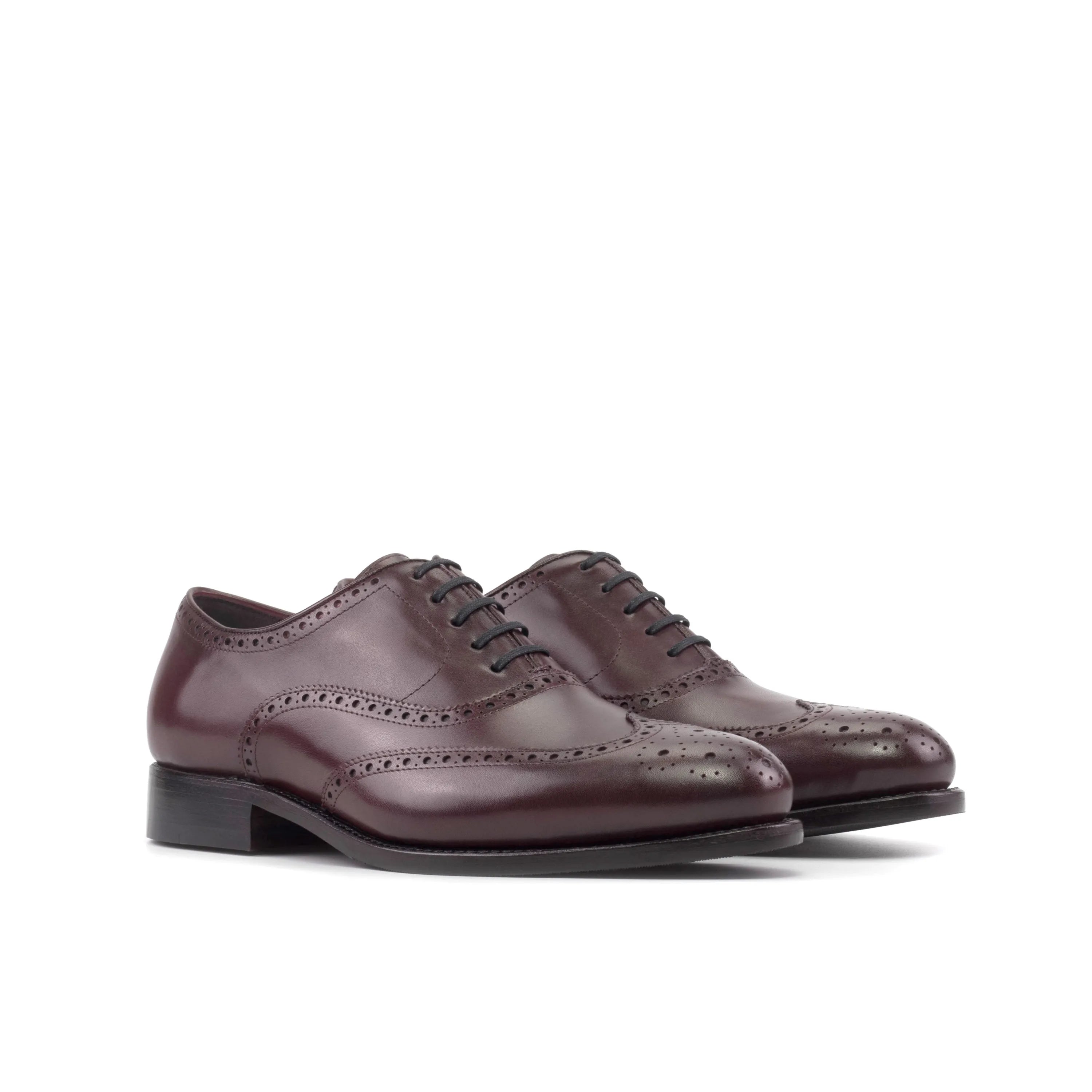 Pair of brown leather wingtip dress shoes named Borock full brogue shoes for the fast lane