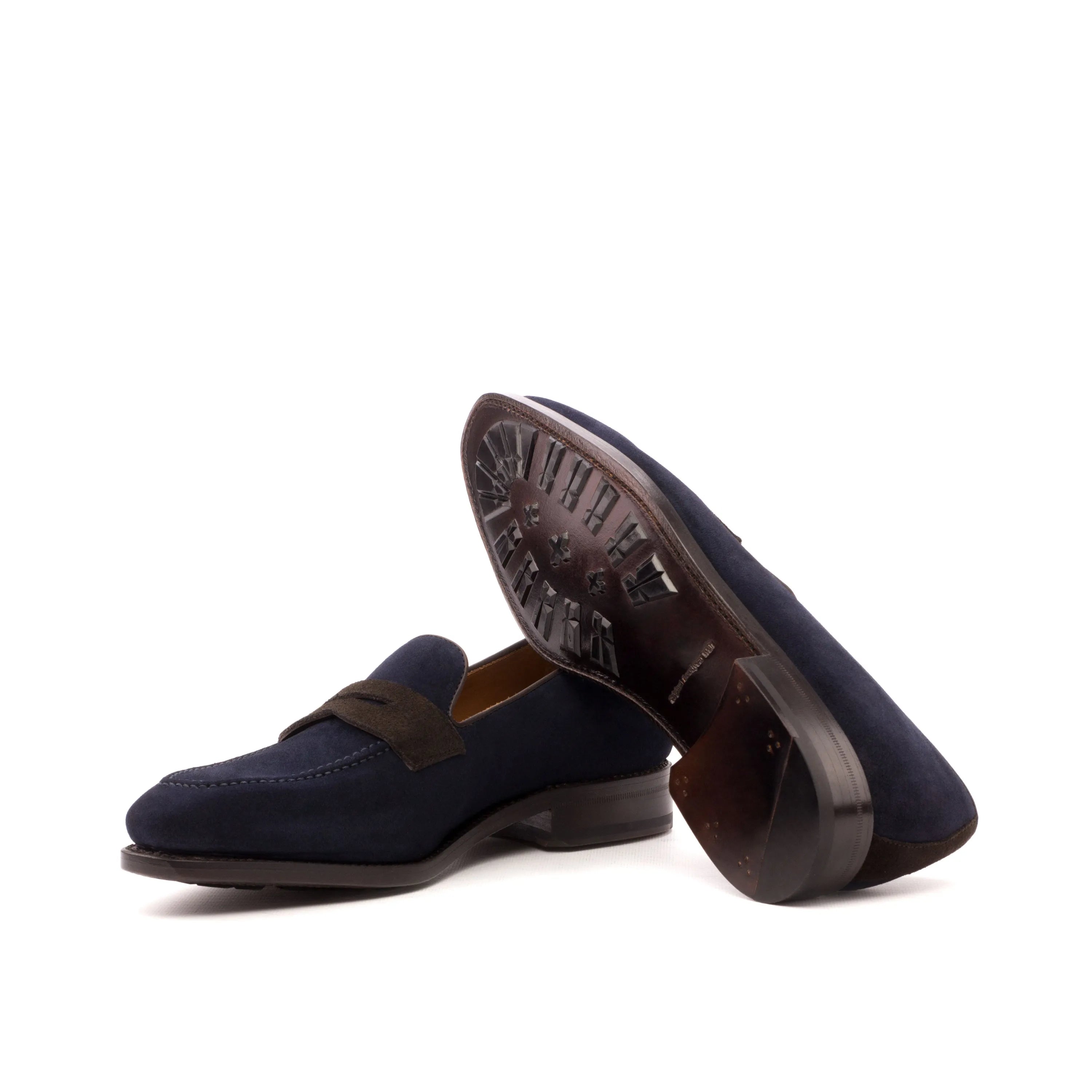 Navy blue suede Cagle Loafers displayed elegantly, perfect for stylish occasions