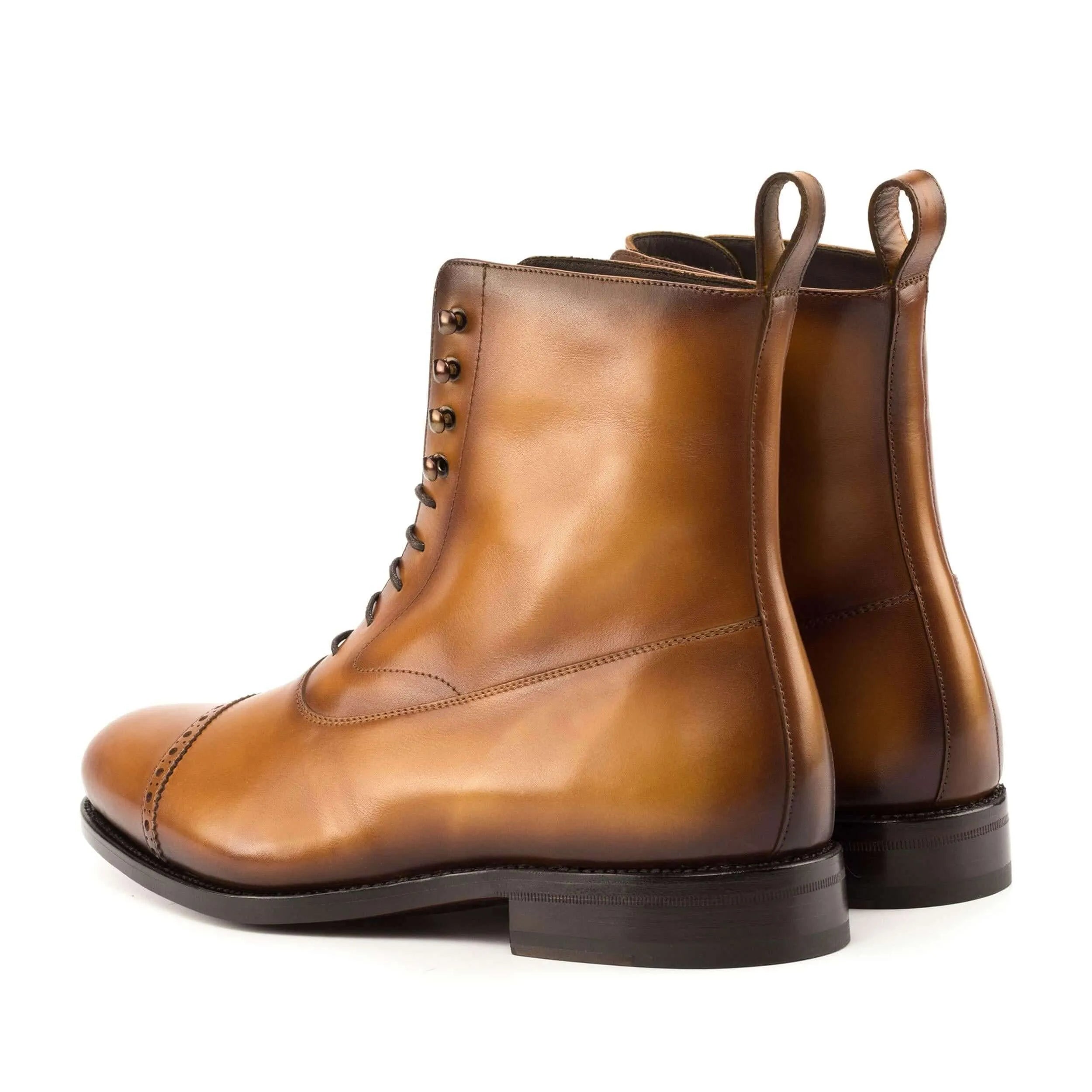 Brown leather lace-up Cainon Balmoral Boots showcasing classic footwear elegance