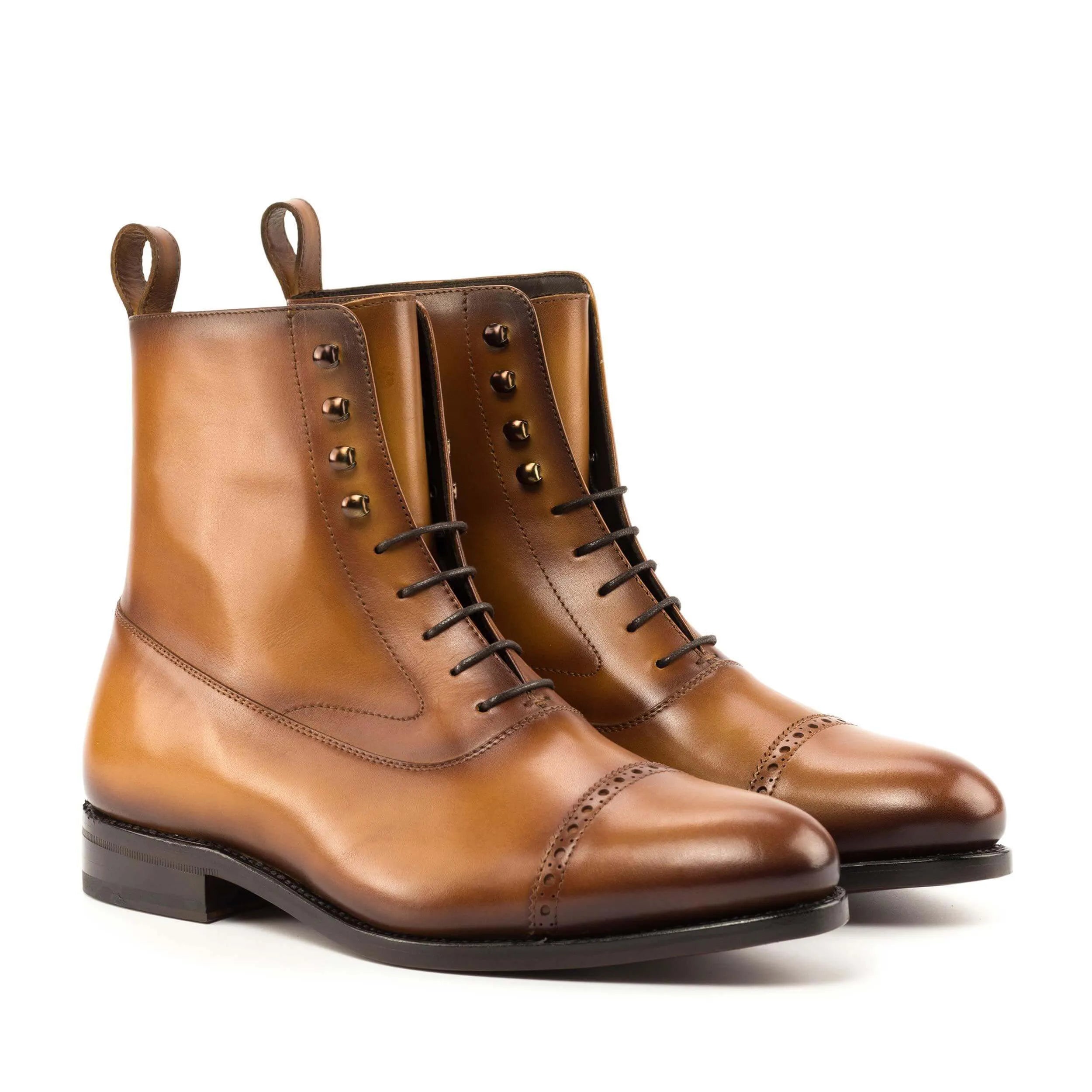 Pair of brown leather lace-up Cainon Balmoral Boots for stylish and elegant footwear