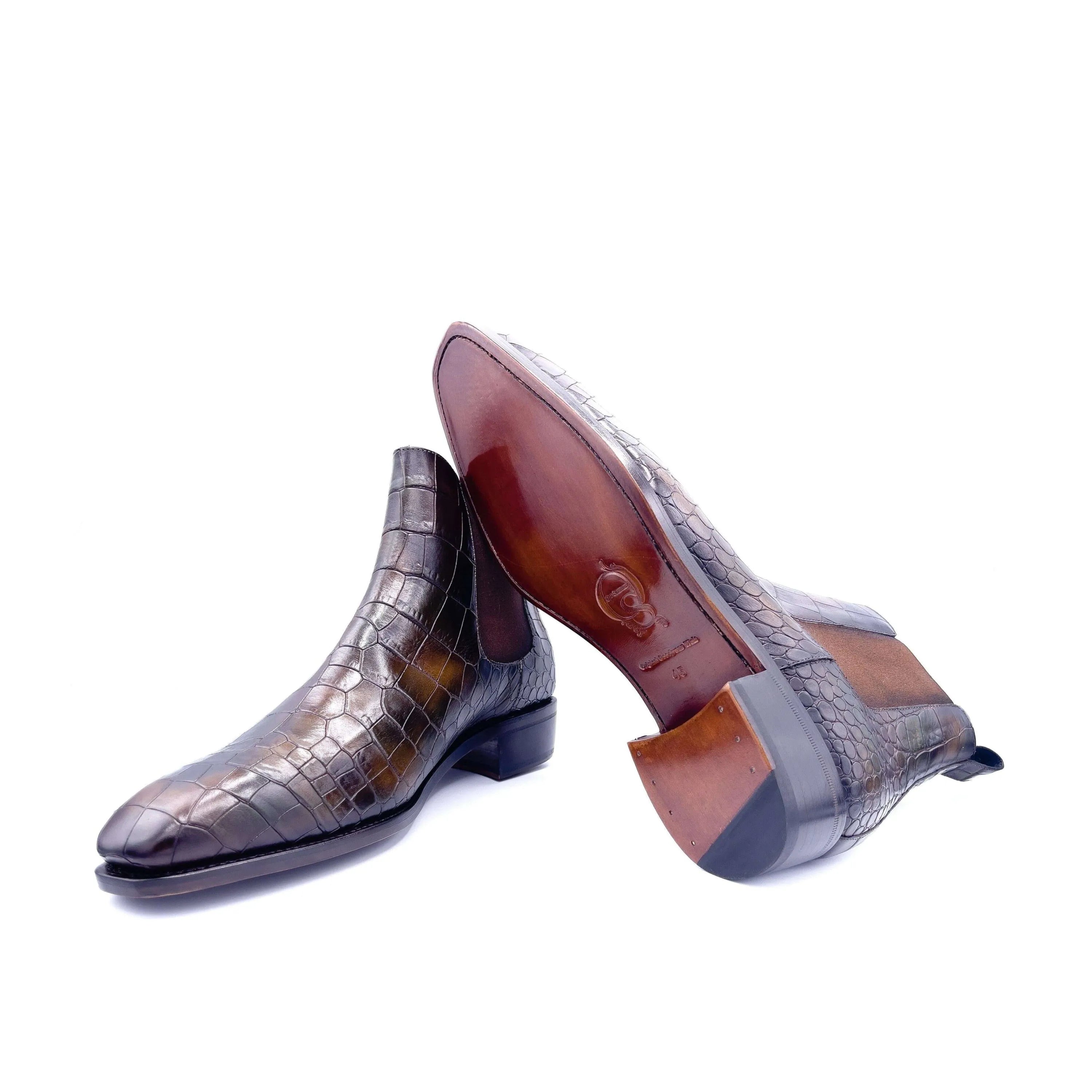 Brown crocodile-patterned Cairo Patina Chelsea boots with chisel toe design
