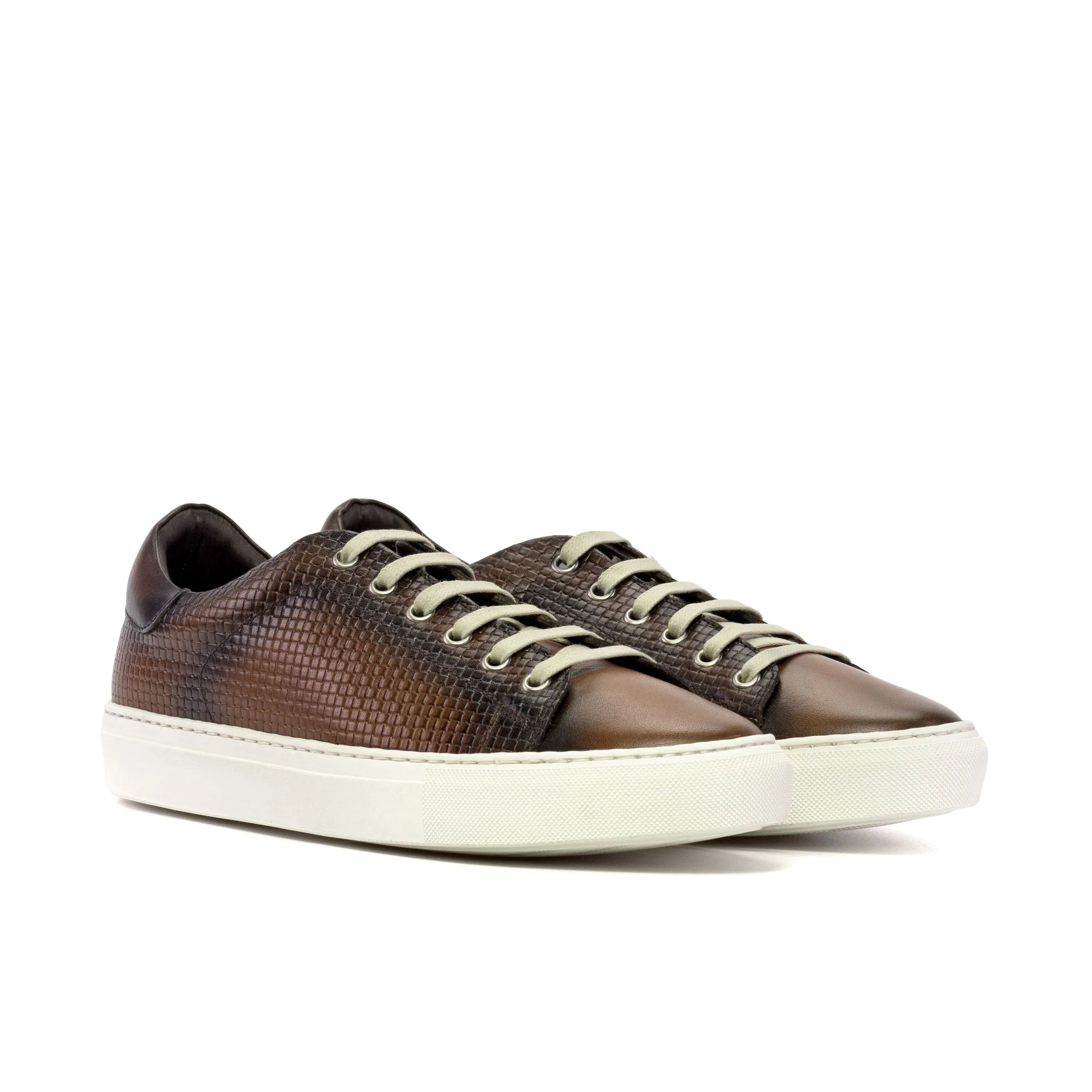 Brown leather sneakers displayed as CapaFive Trainer Sneaker II, stylish and versatile footwear