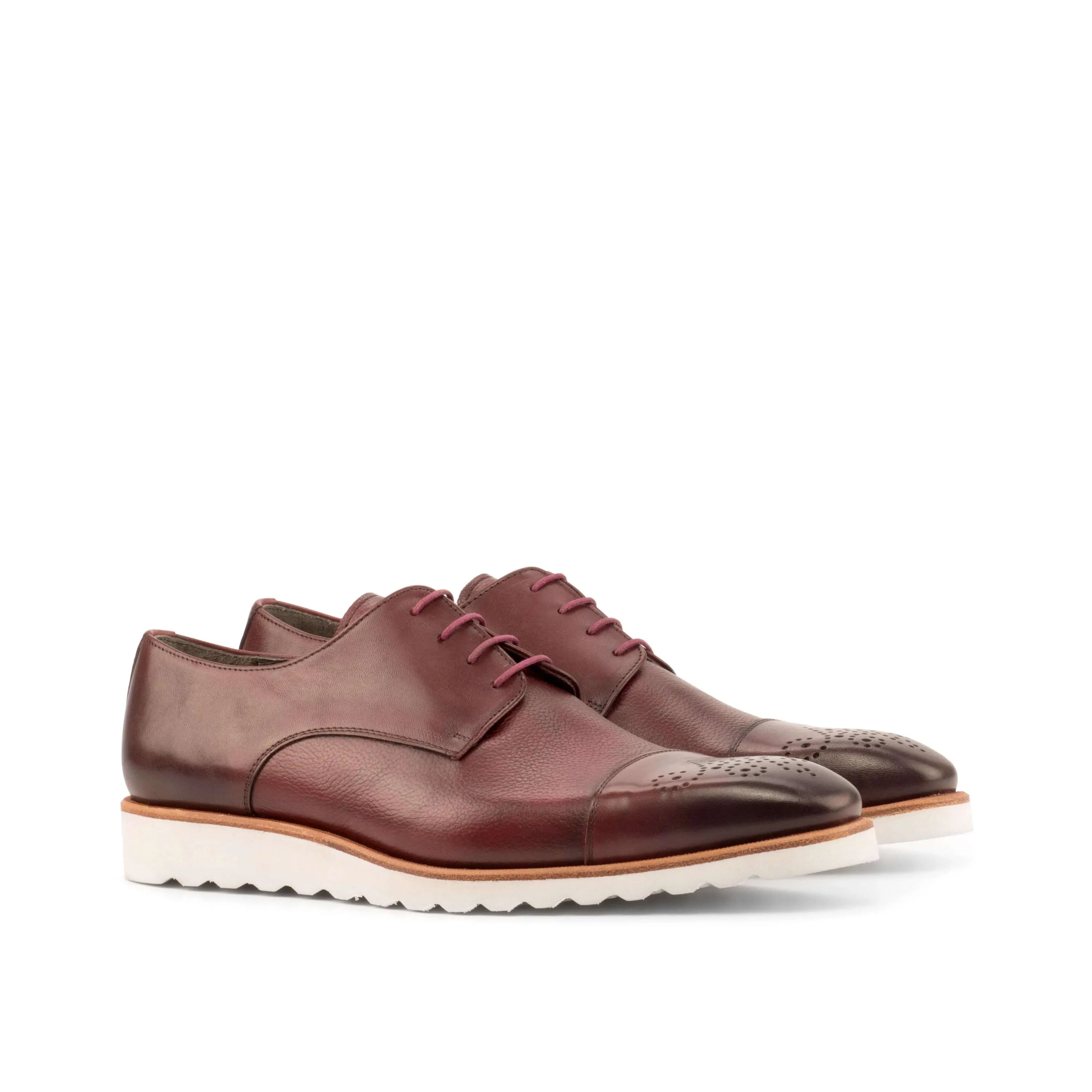 Burgundy leather Chaska Derby Shoes showcasing elegant design and craftsmanship