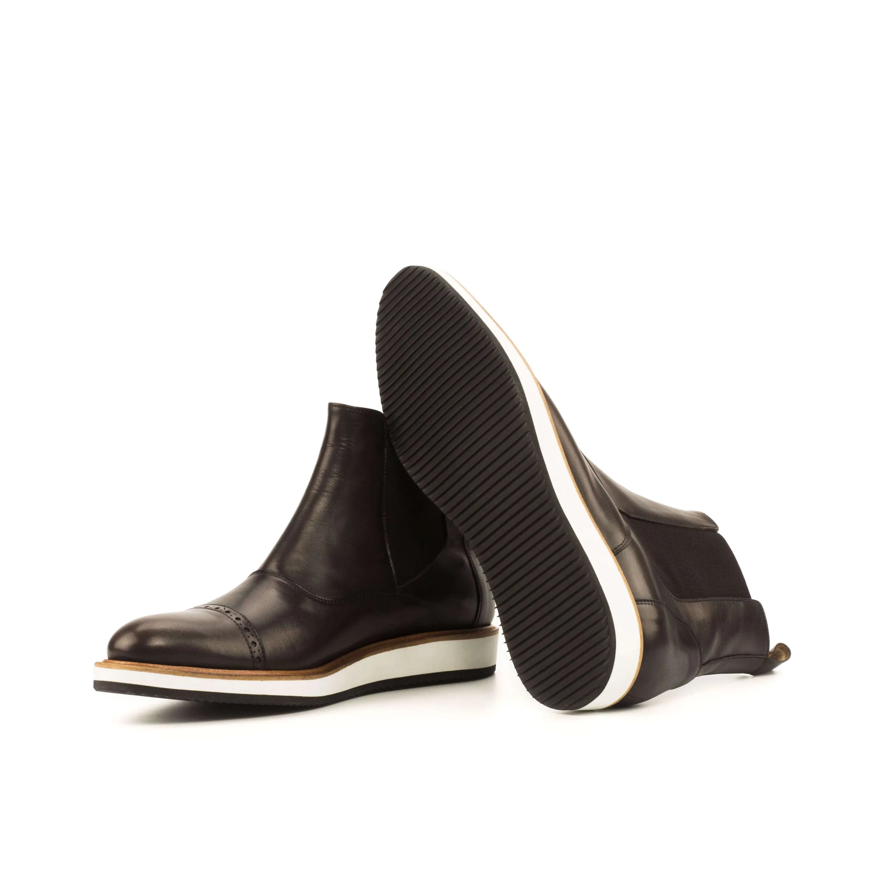 Brown leather Choovio Chelsea boots with white soles for a stylish footwear choice