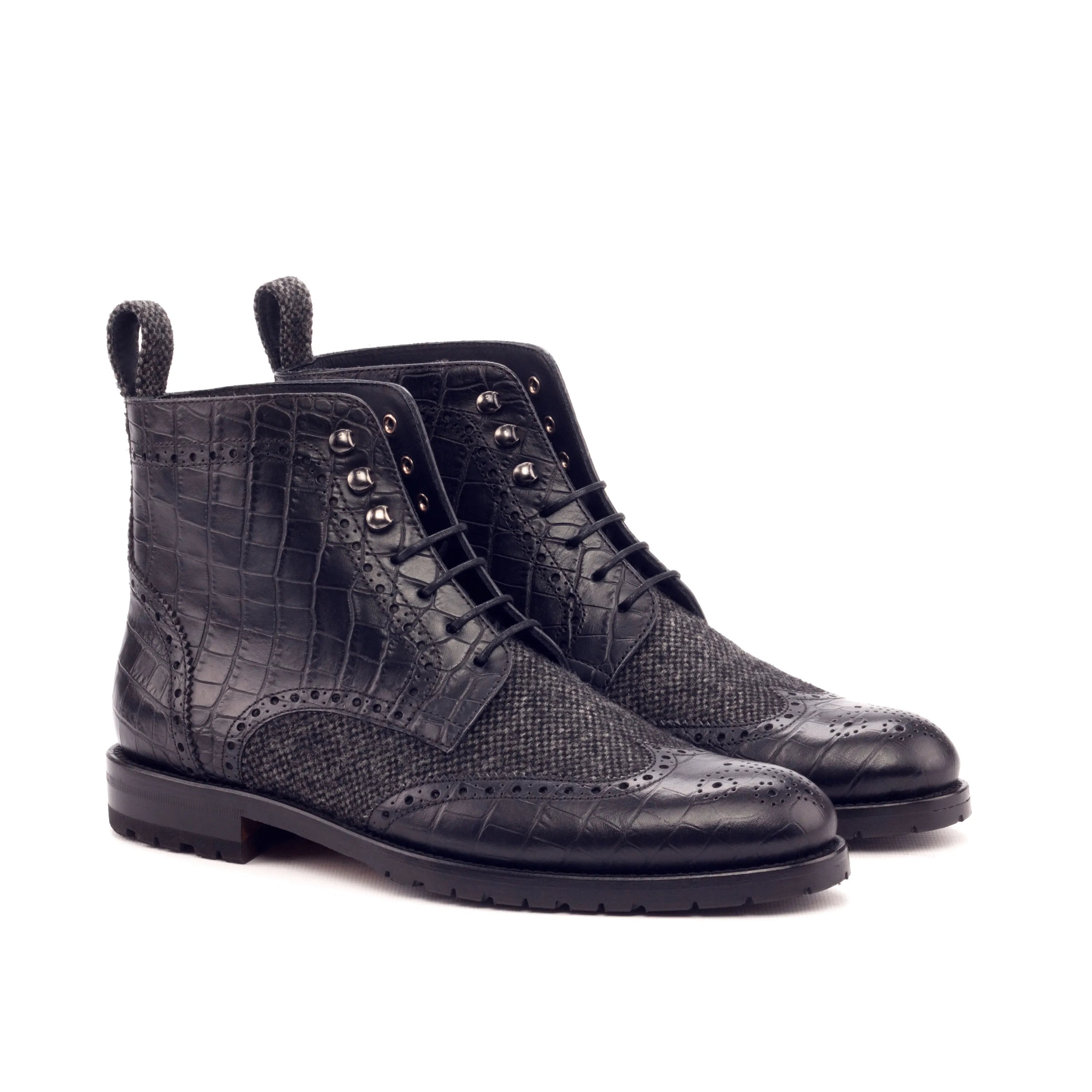 Pair of black leather and tweed lace-up military brogue boots for ladies