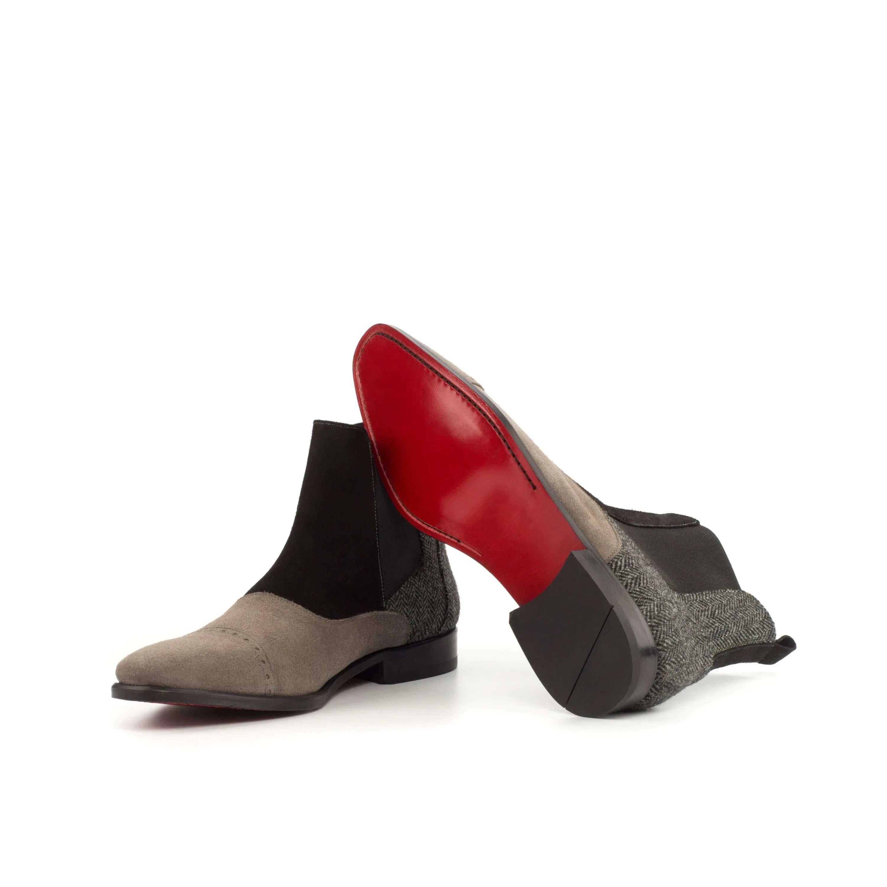 Two-toned leather CM20 Chelsea Boots with striking red soles for stylish footwear