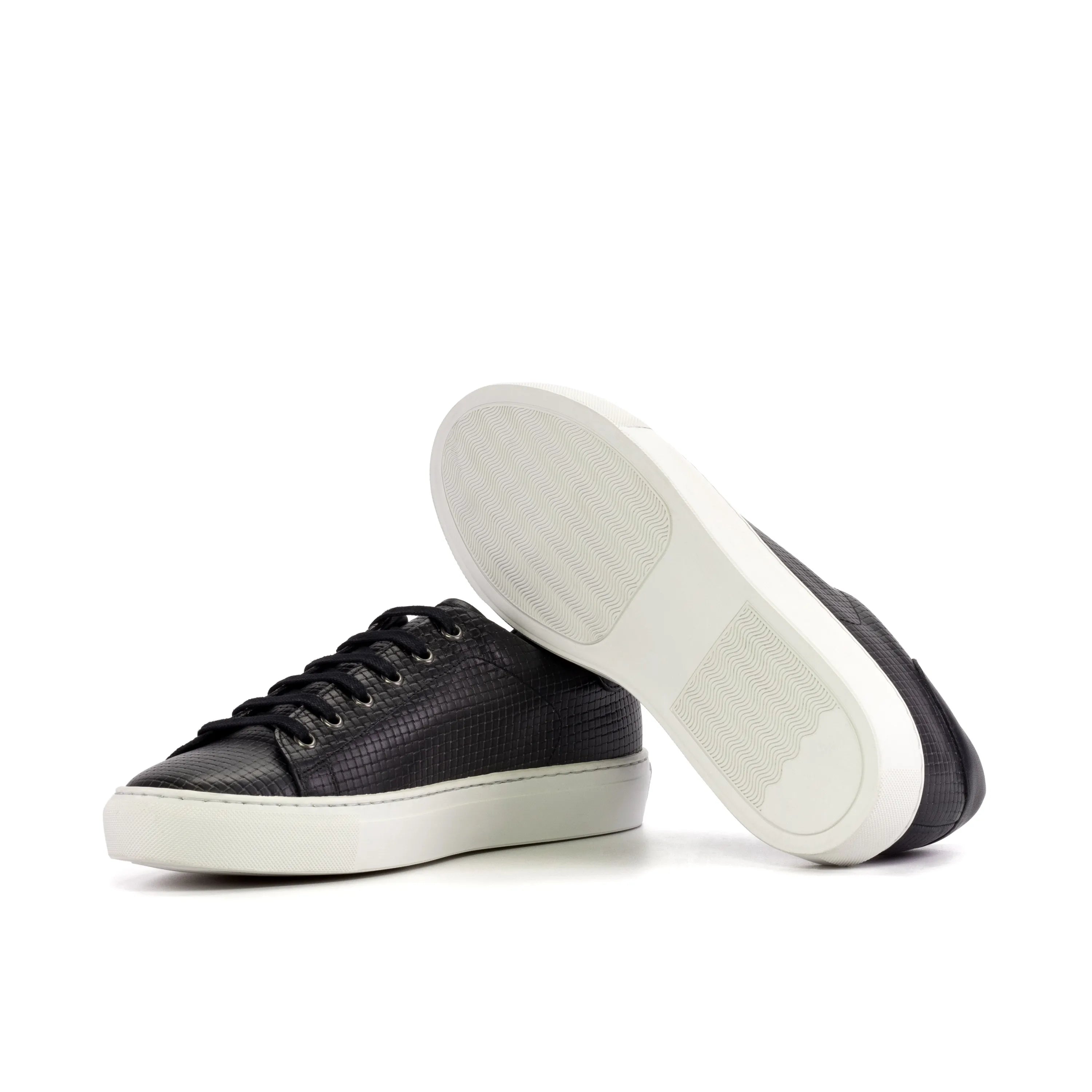 Black leather Corsa Trainer Sneaker with white soles, featuring a stylish cupsole design