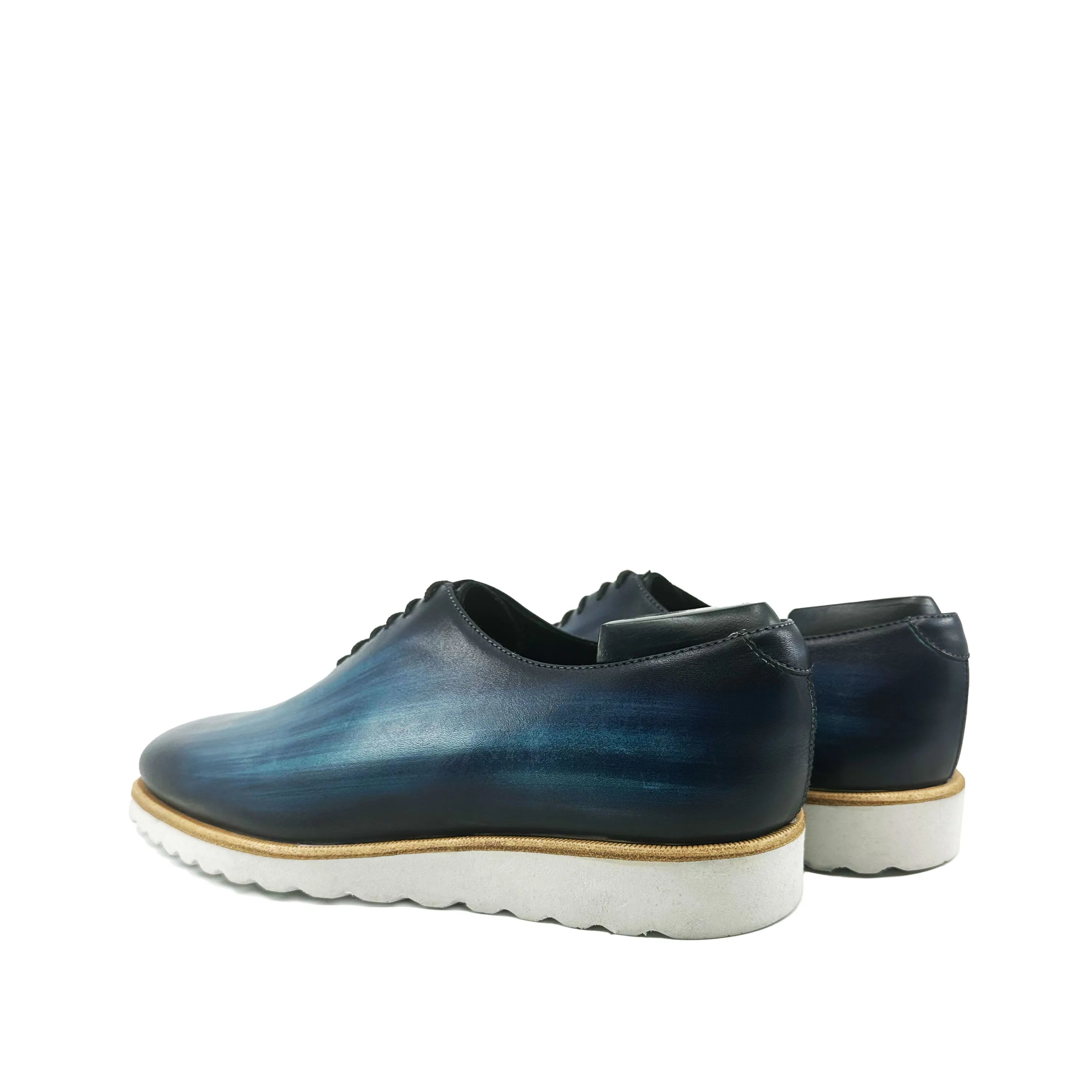 Blue leather dress shoes from Danny Patina Wholecut collection for stylish elegance