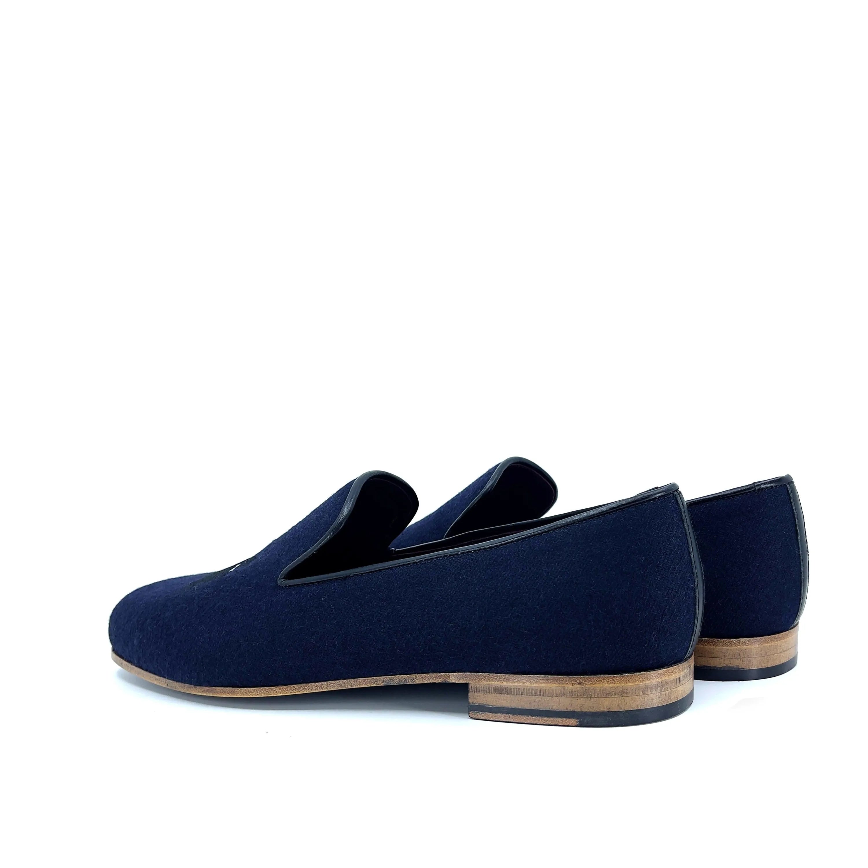 Navy blue loafers featured in DDrapper Wellington Slipon for stylish comfort