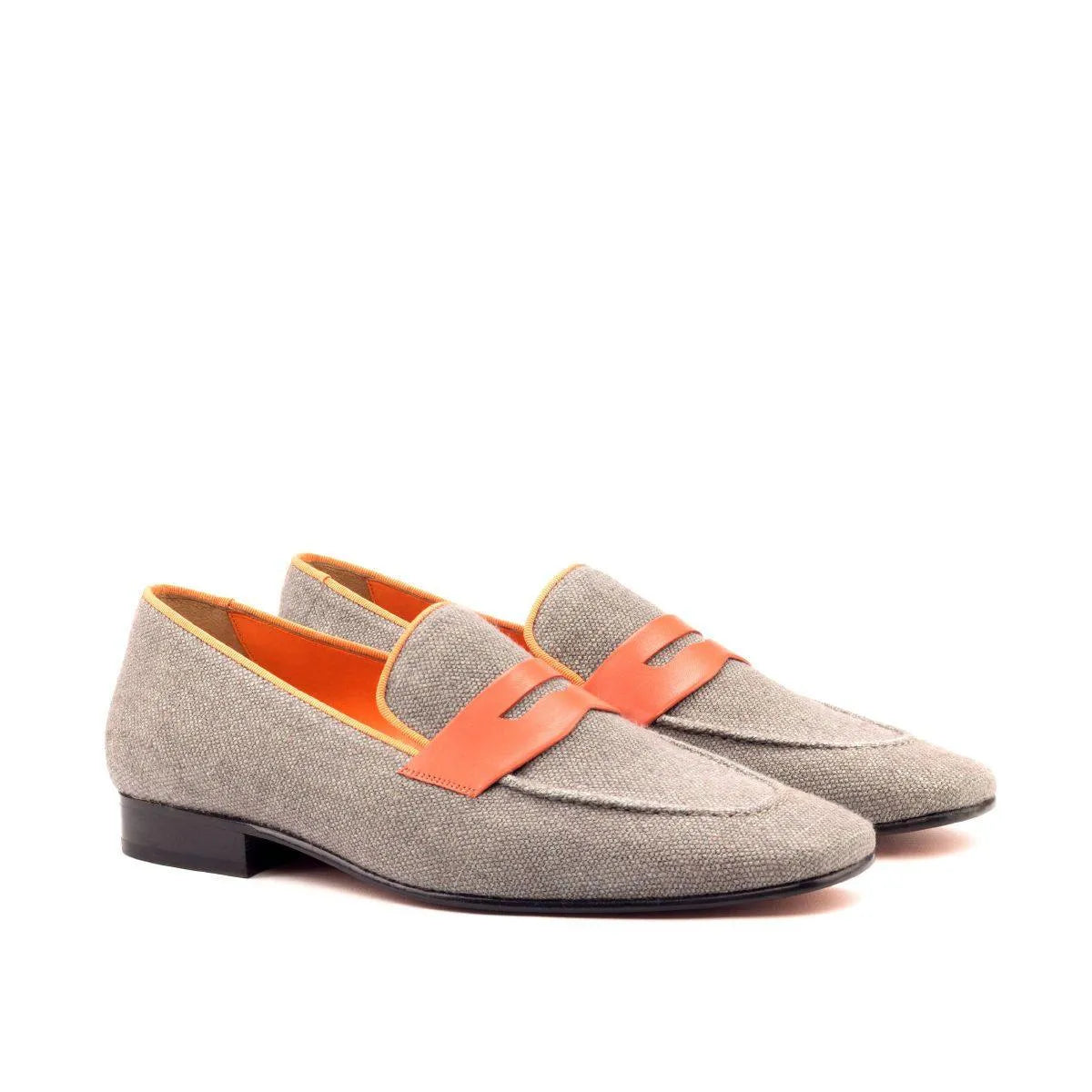 Gray and orange penny loafers from the Delight Drake slipon collection
