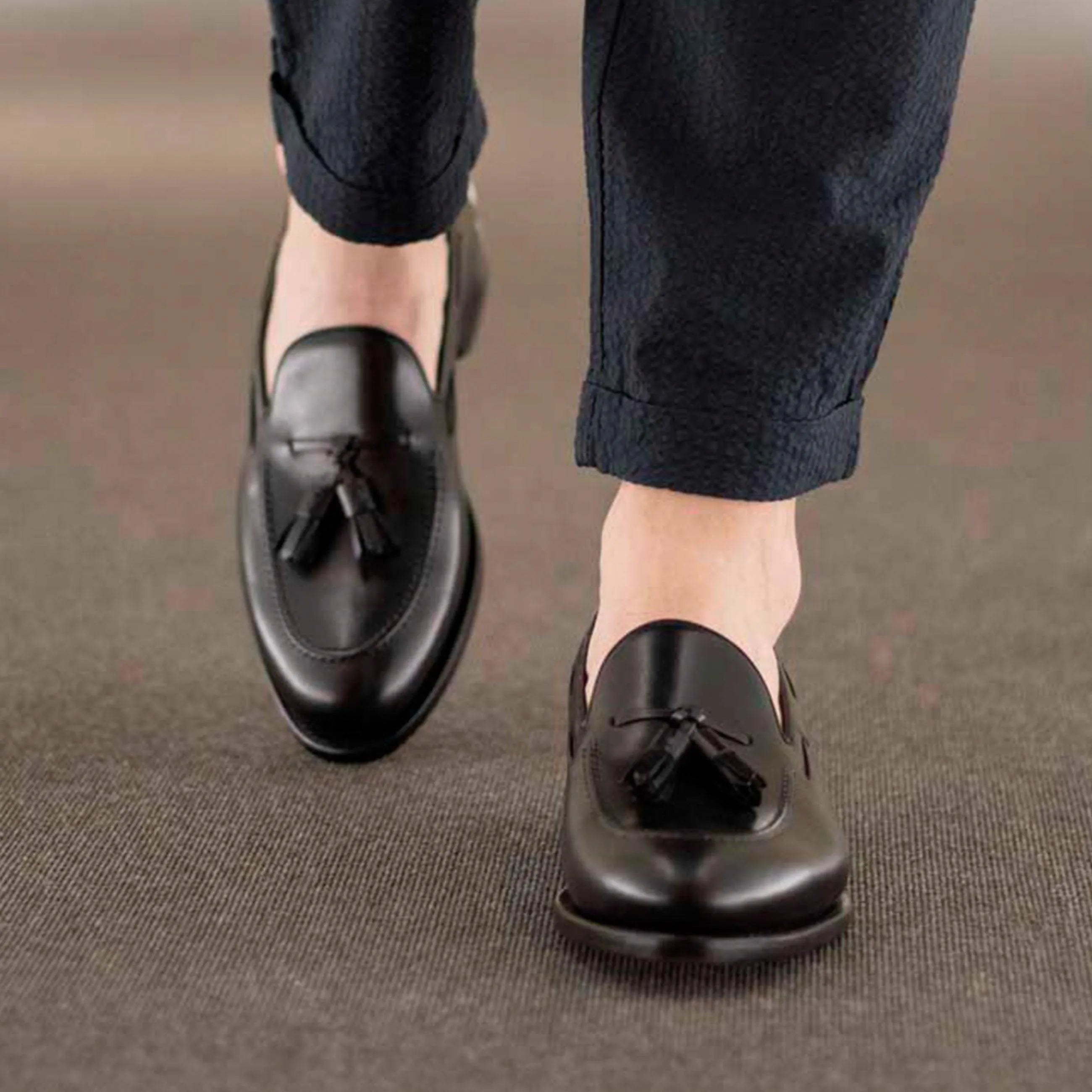 Black leather tassel loafers from the Denver Loafers collection for stylish business days