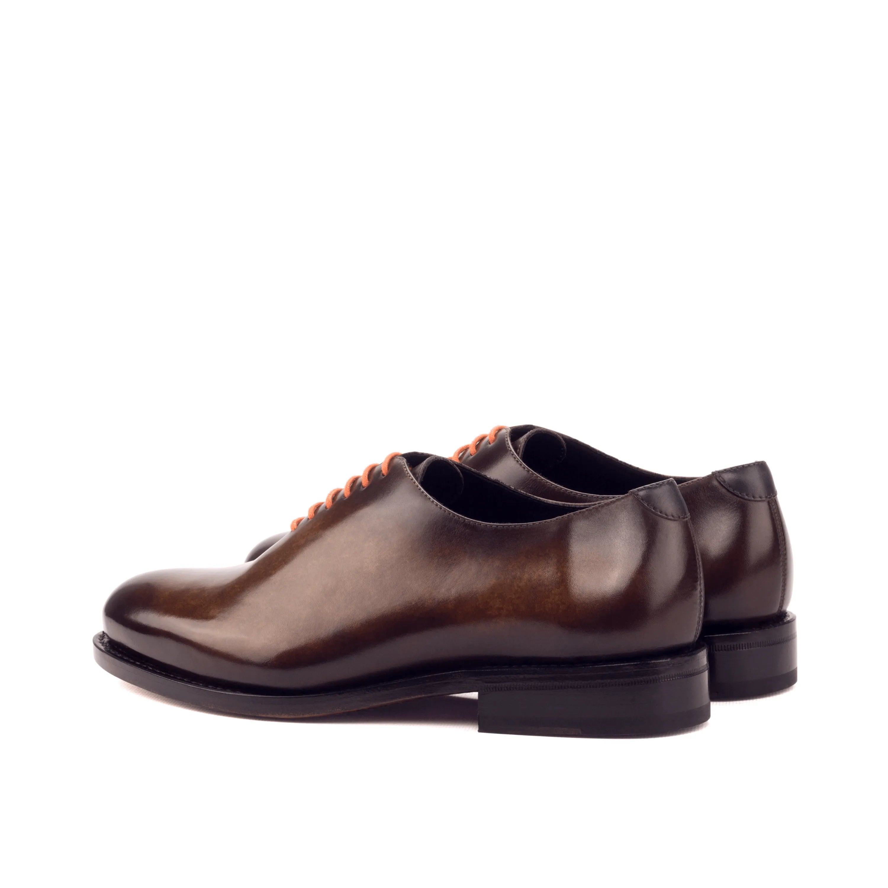 Brown leather dress shoes featuring Dillinger Whole Cut Patina II with rounded toe design