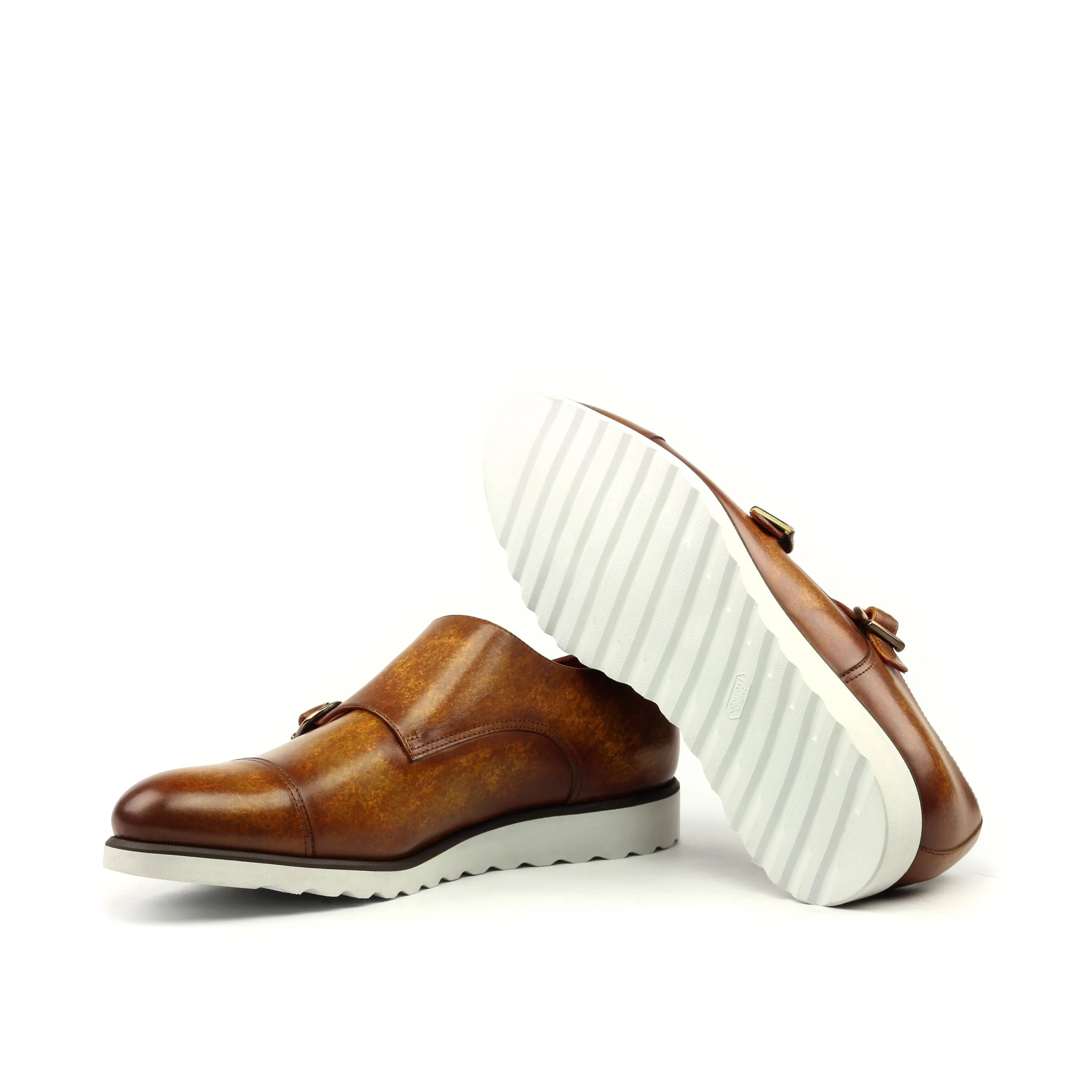 Brown leather Dilya Double Monk Patina shoes showcasing a stylish double monk strap design