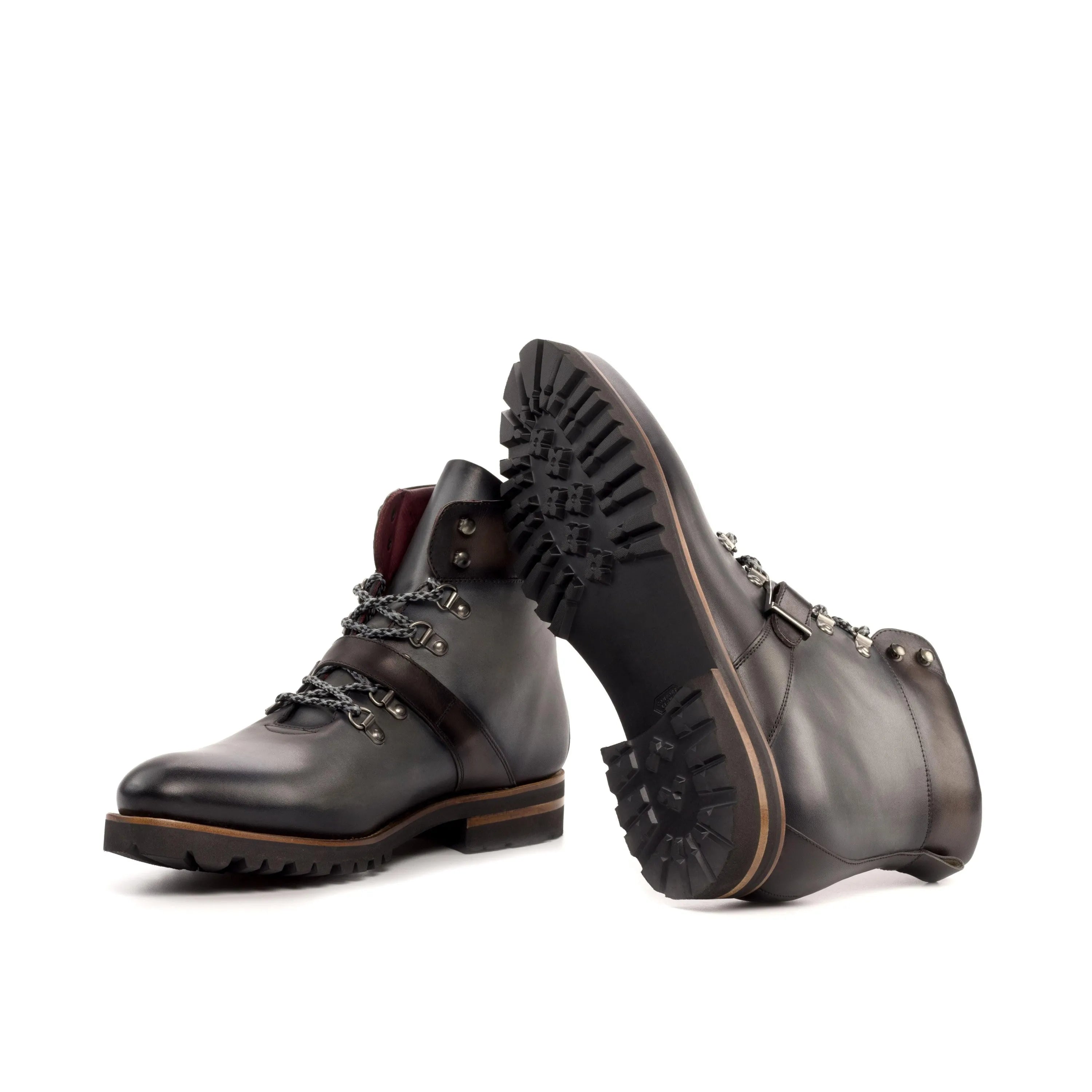 Pair of gray leather Dima Hiking Boots designed for durability and comfort in outdoor adventures